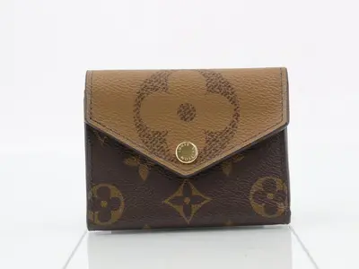 Reverse Portefeuille Zoé, with box and dust bag.