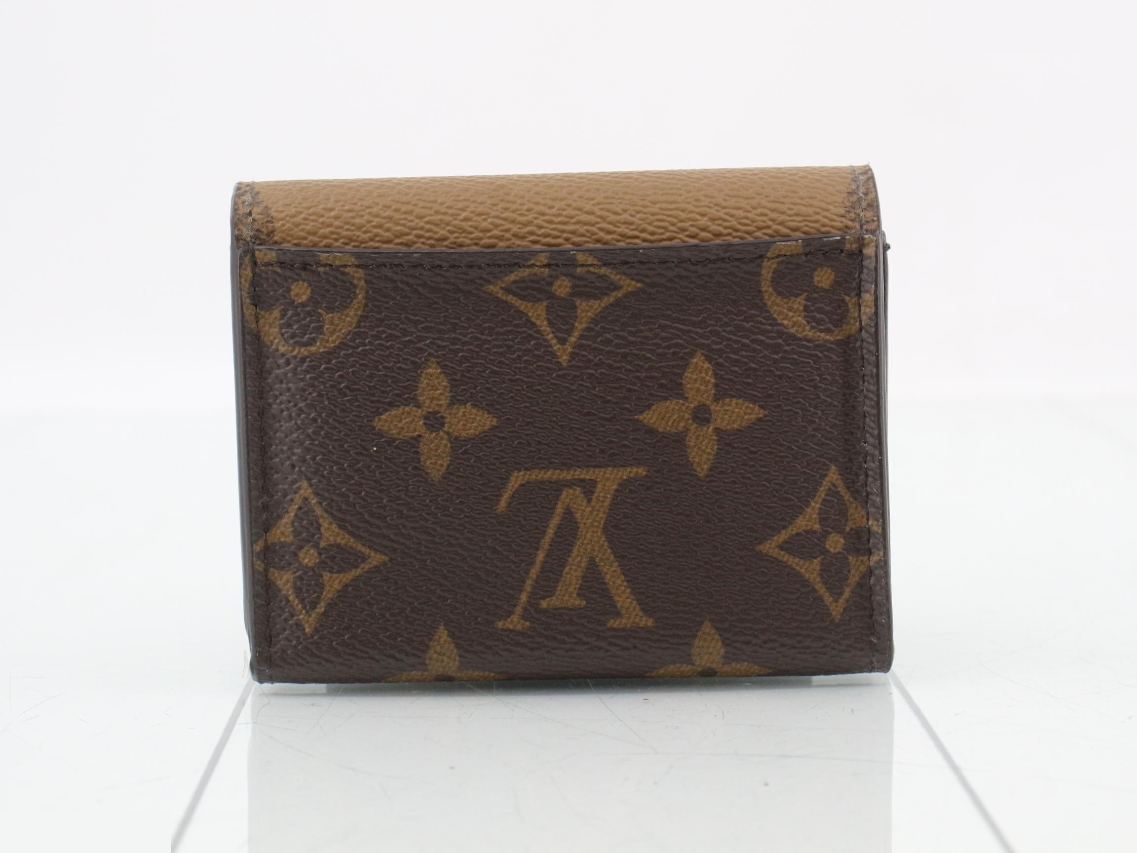 Reverse Portefeuille Zoé, with box and dust bag. — view 2