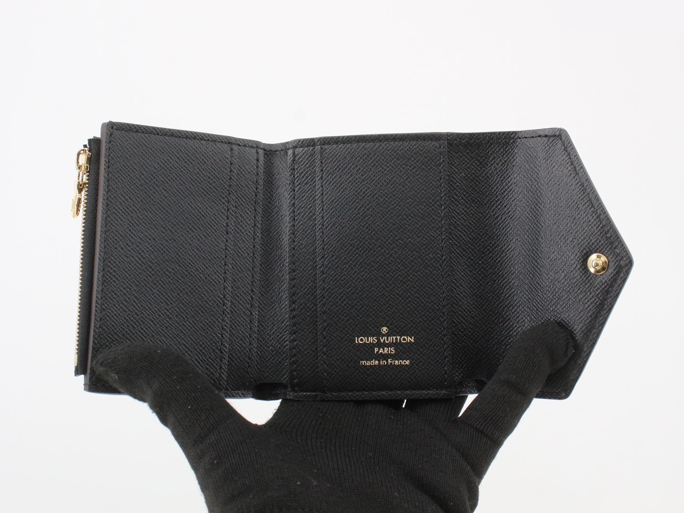 Reverse Portefeuille Zoé, with box and dust bag. — view 4