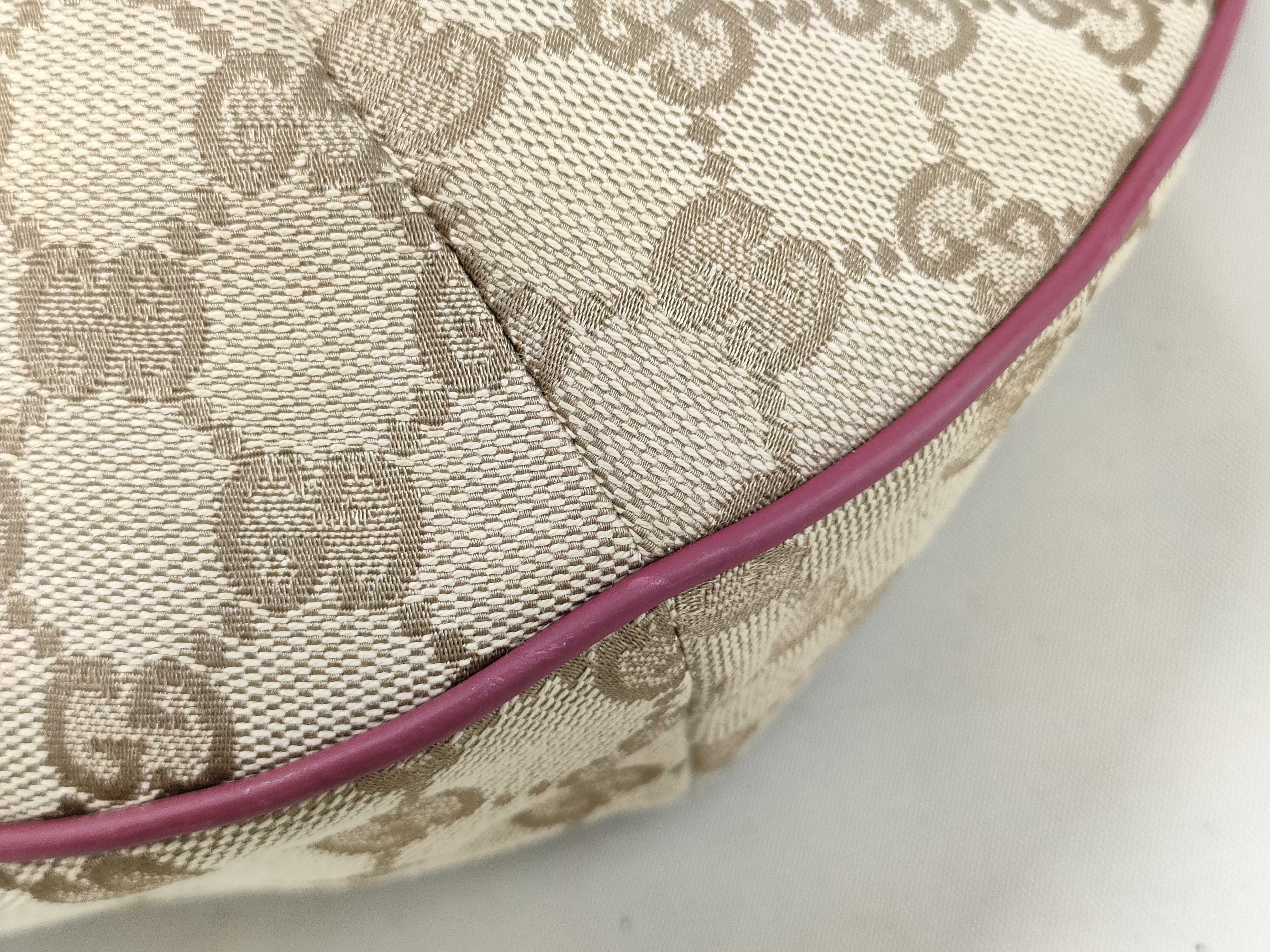 GG Canvas Shoulder Bag with GG Pattern, Webbing Strap, and Leather Trim. — view 4