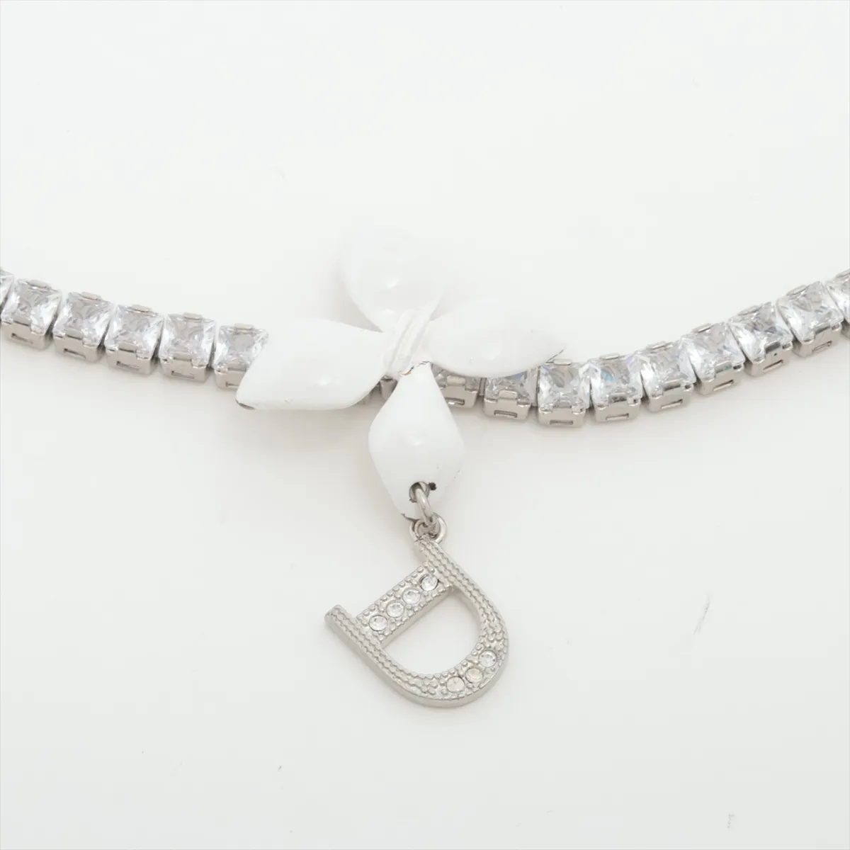 D-logo choker, metal and rhinestones, silver. Shows signs of wear including — view 2