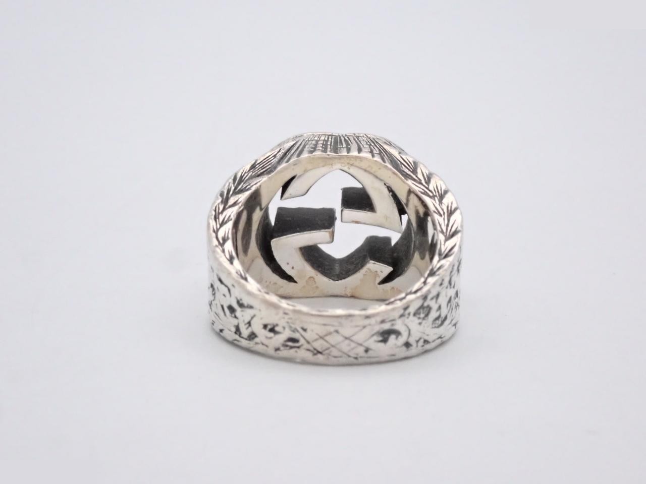 Interlocking G, stamped 9, actual size #8 — view 2