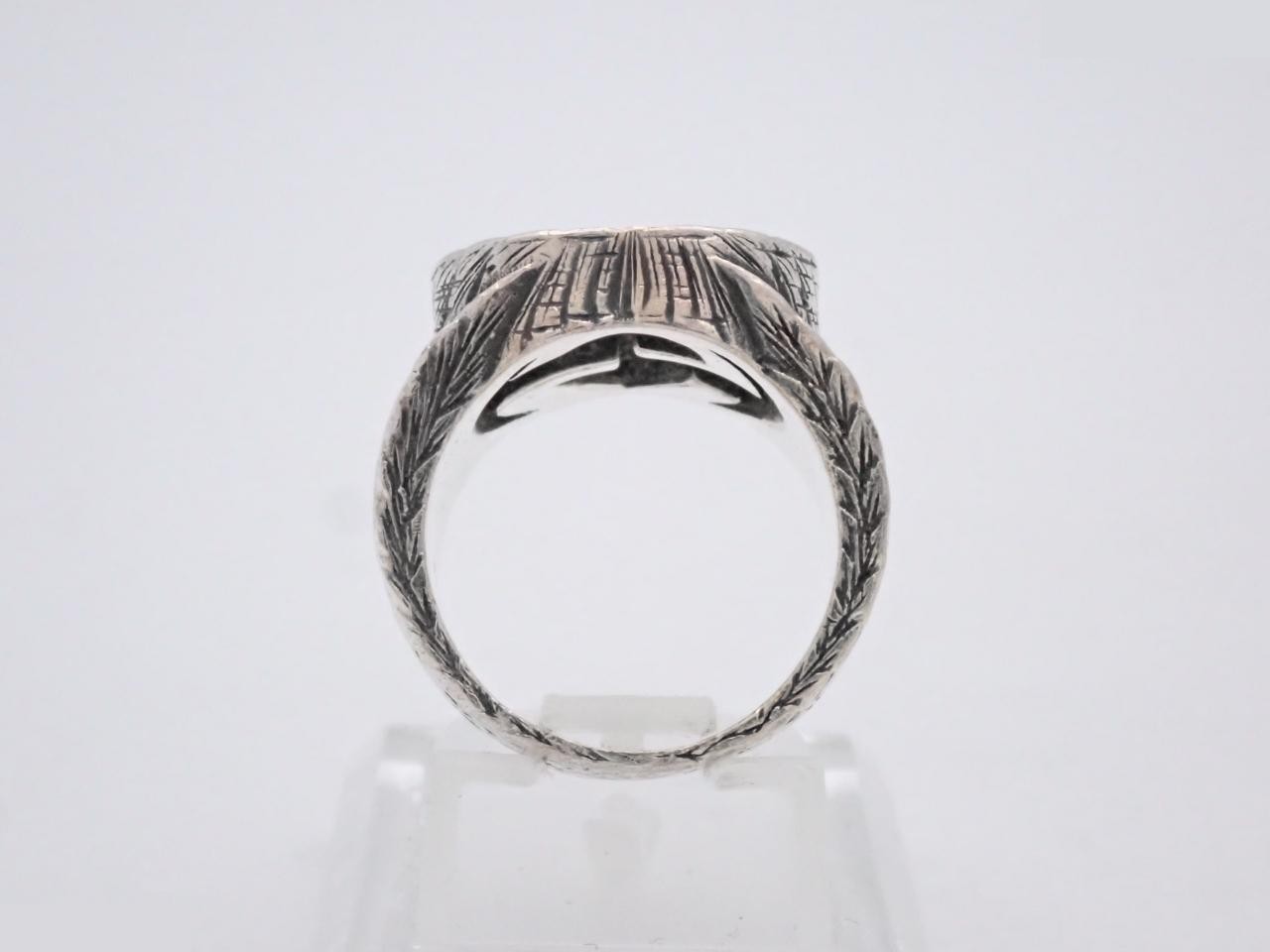 Interlocking G, stamped 9, actual size #8 — view 3