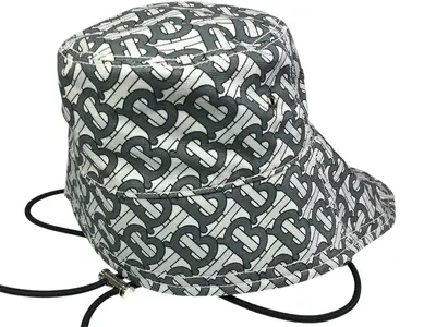 Unused, with tags attached, Burberry bucket hat, TB all-over pattern.