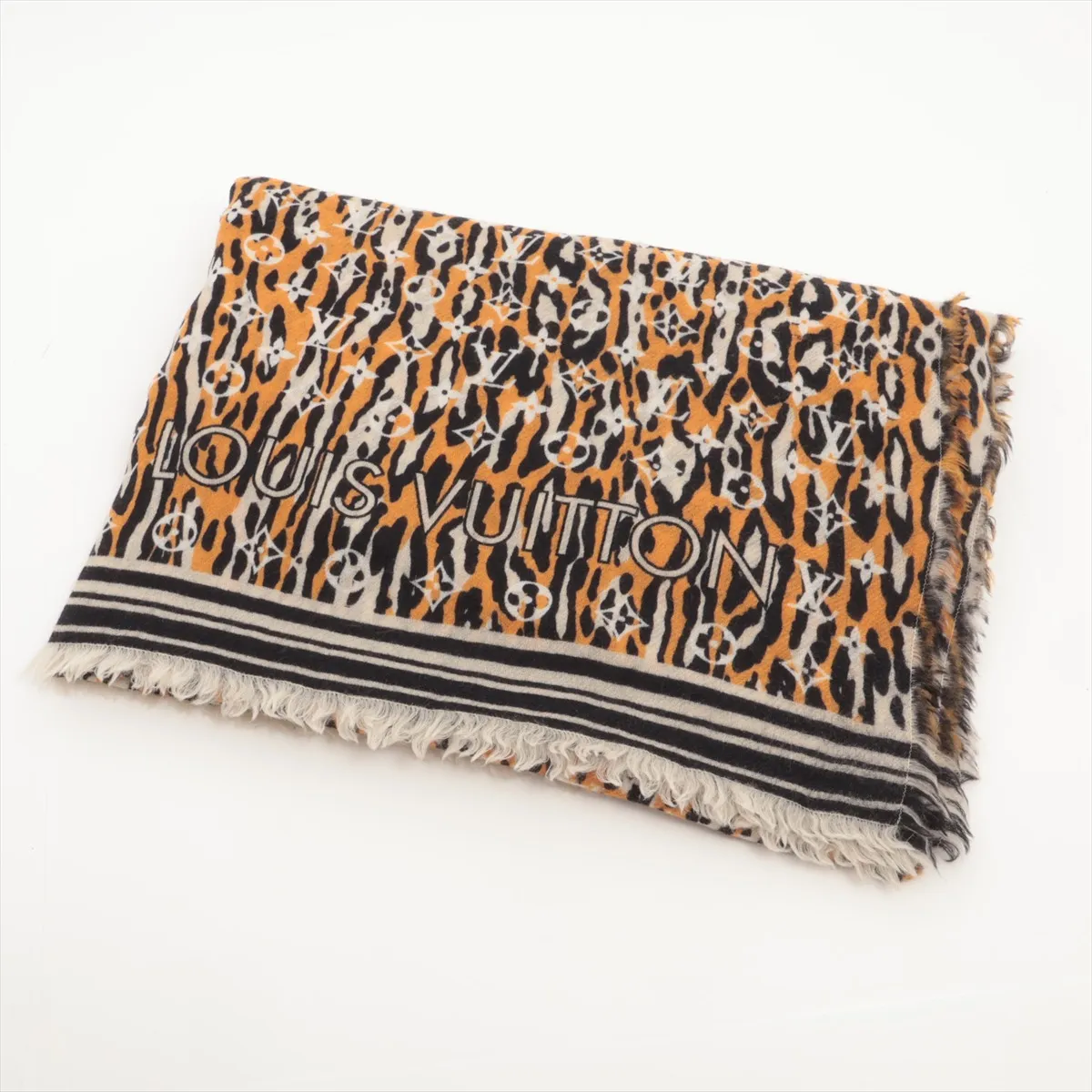 M73645 Etol Monogram Jungle GM0139 Stole, Wool, Orange. Shows signs of wear,
