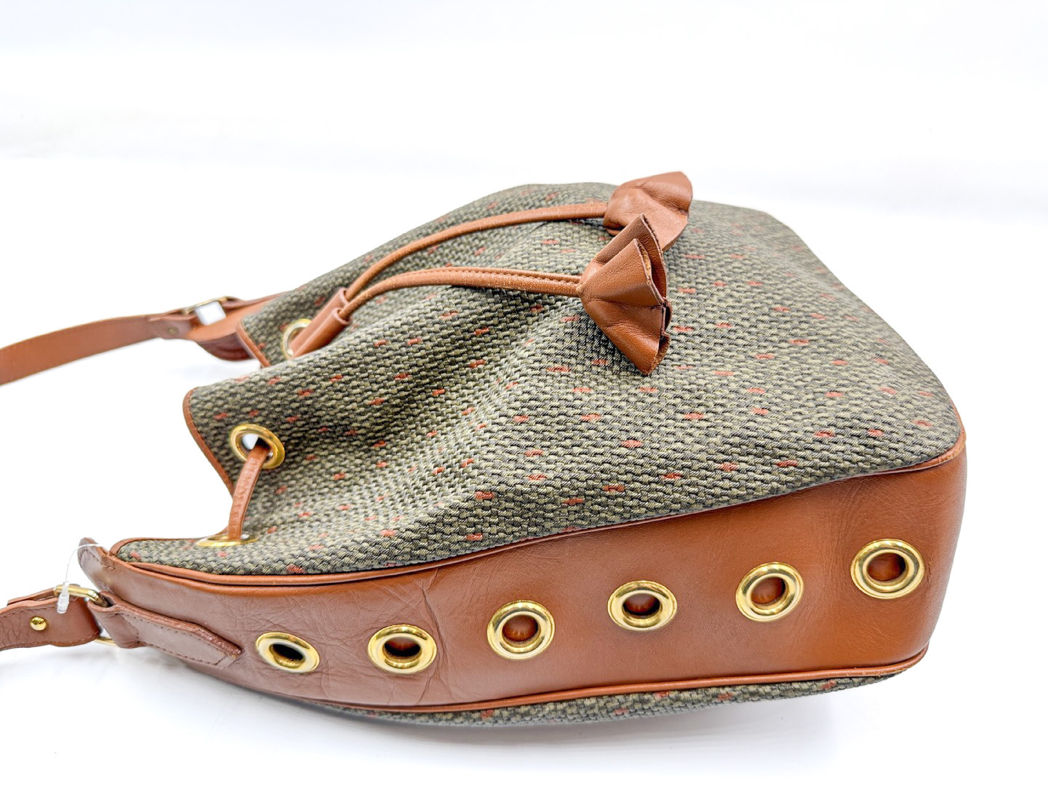 drawstring shoulder bag, perforated leather, gold hardware. — view 2