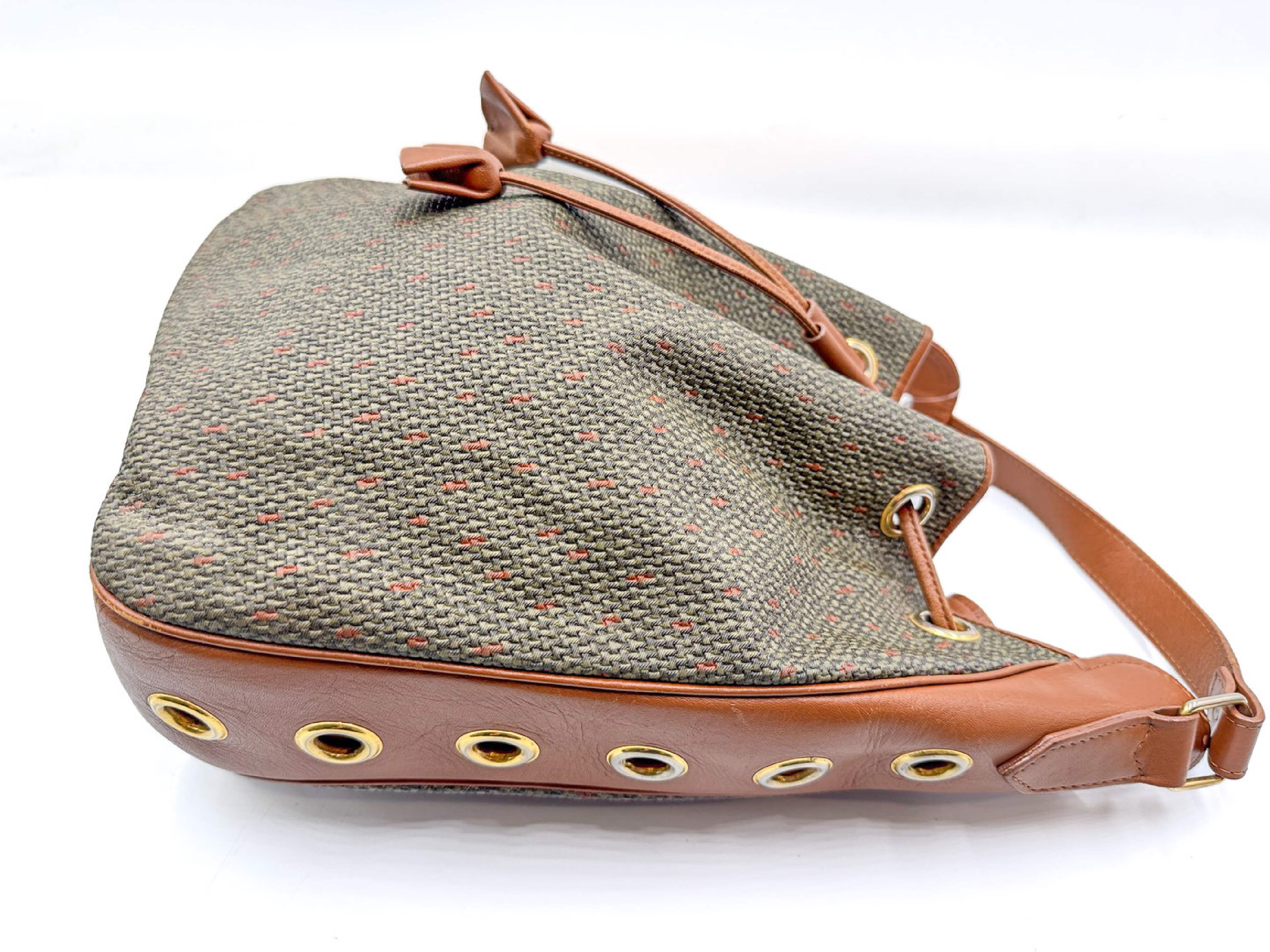 drawstring shoulder bag, perforated leather, gold hardware. — view 3