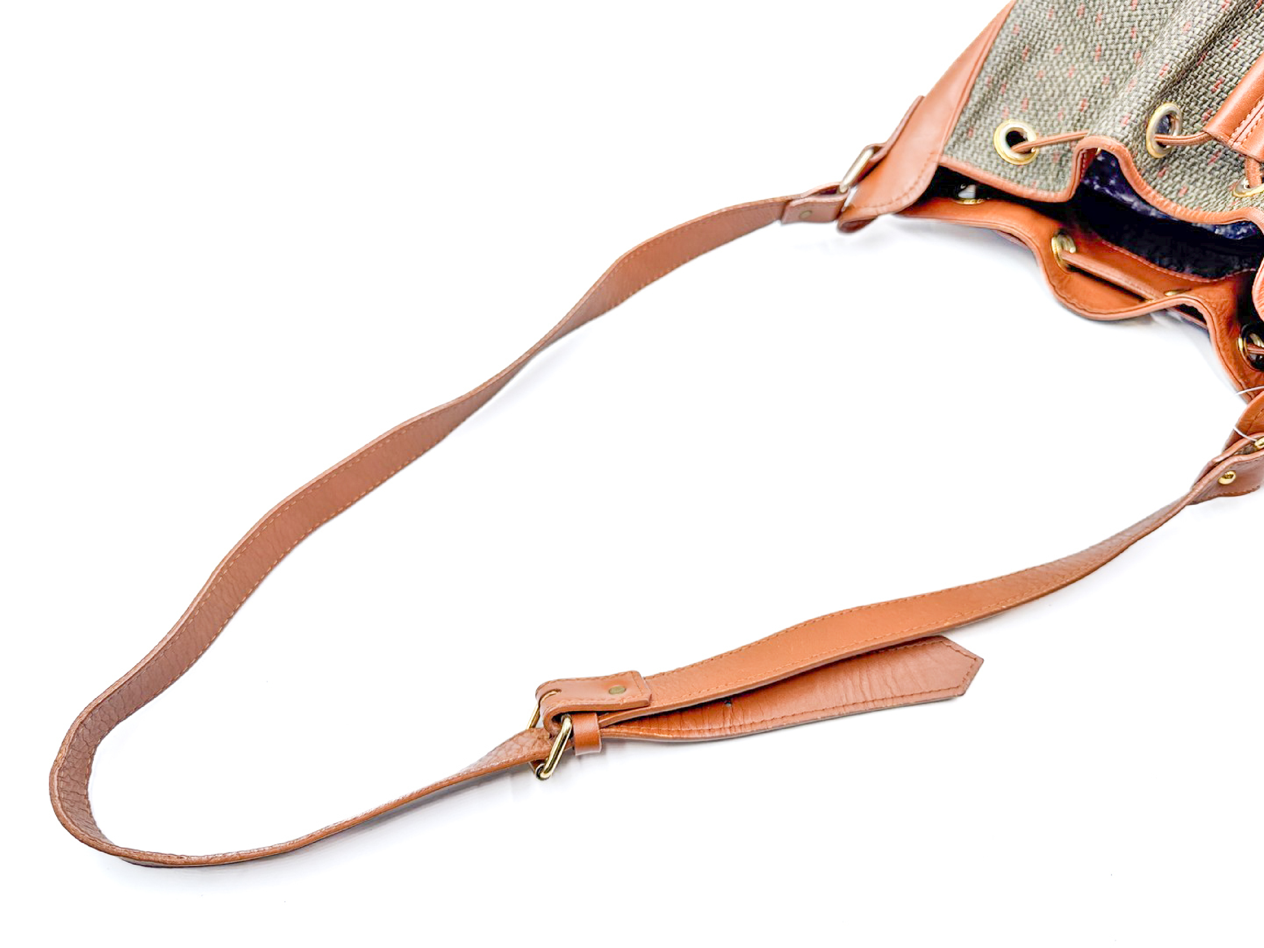 drawstring shoulder bag, perforated leather, gold hardware. — view 7