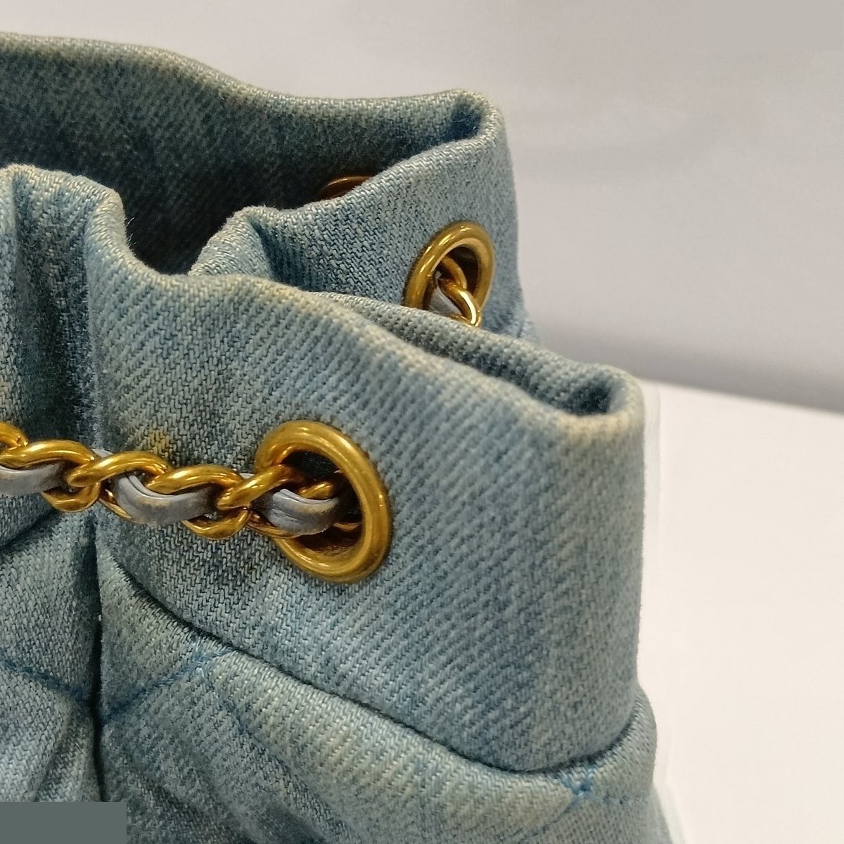 Matelassé denim x leather shoulder bag, chain shoulder bag, drawstring bag — view 9