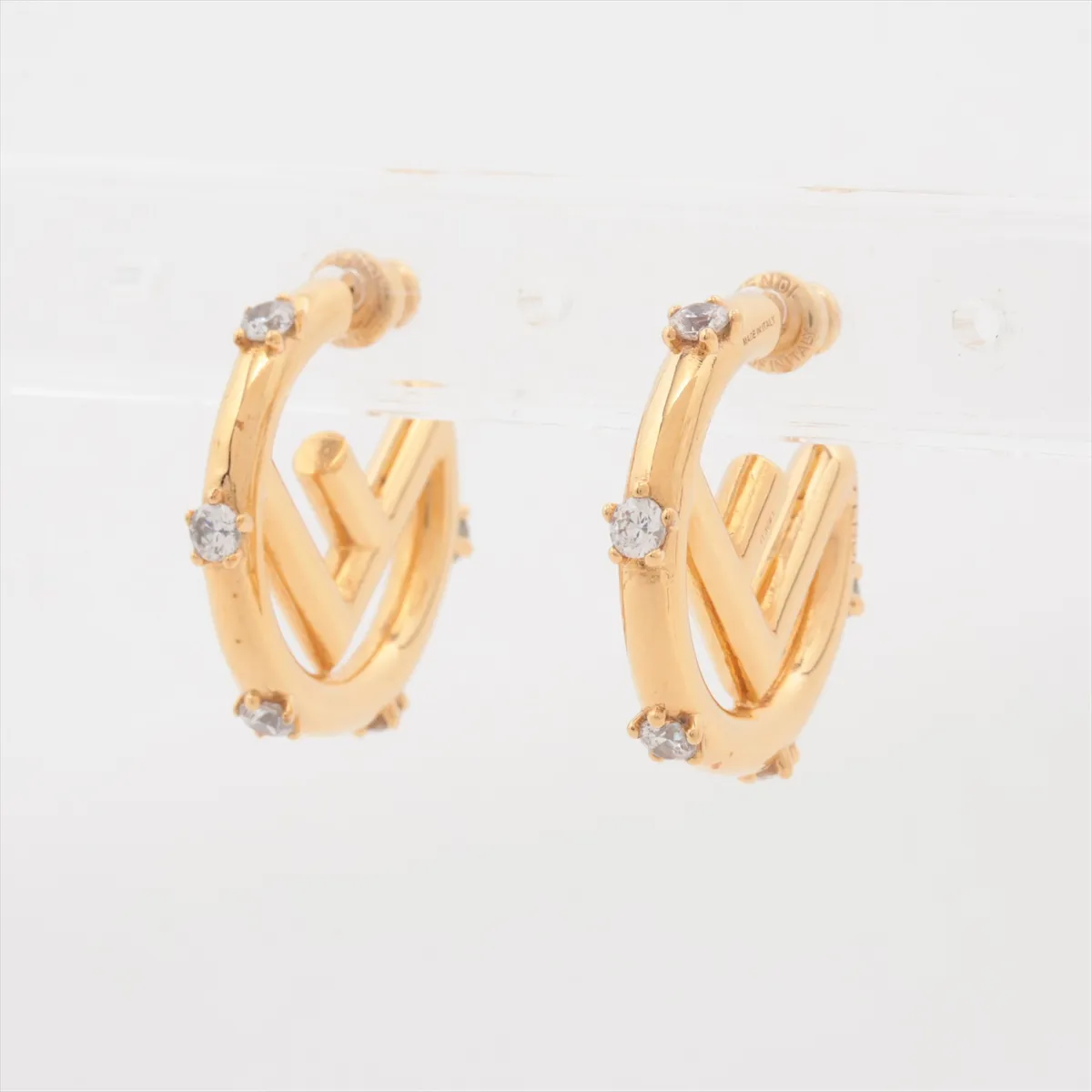 F is Fendi earrings (for both ears), GP x rhinestone, gold. Shows signs of wear: