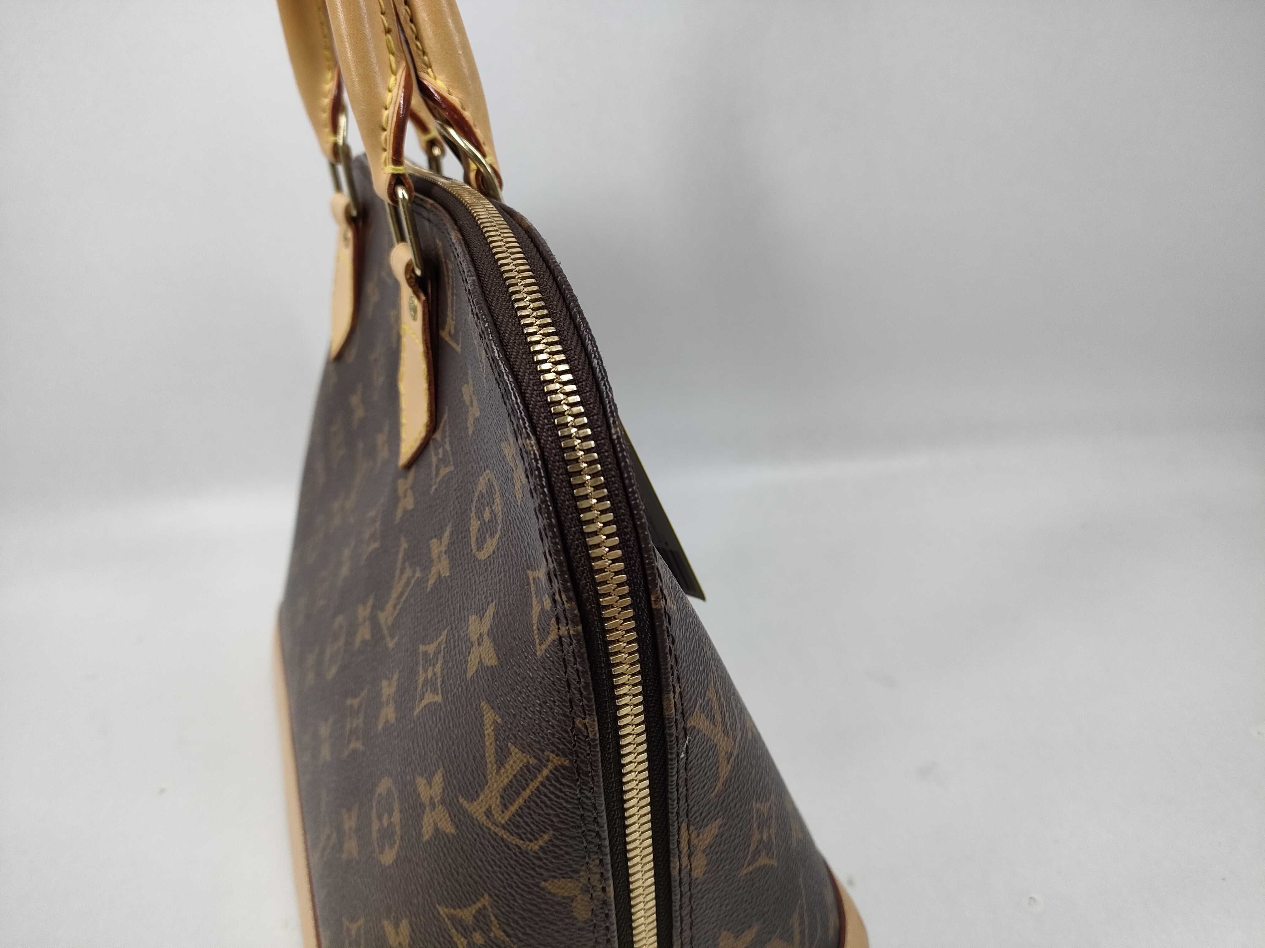 Monogram Alma Handbag (with ST) — view 6