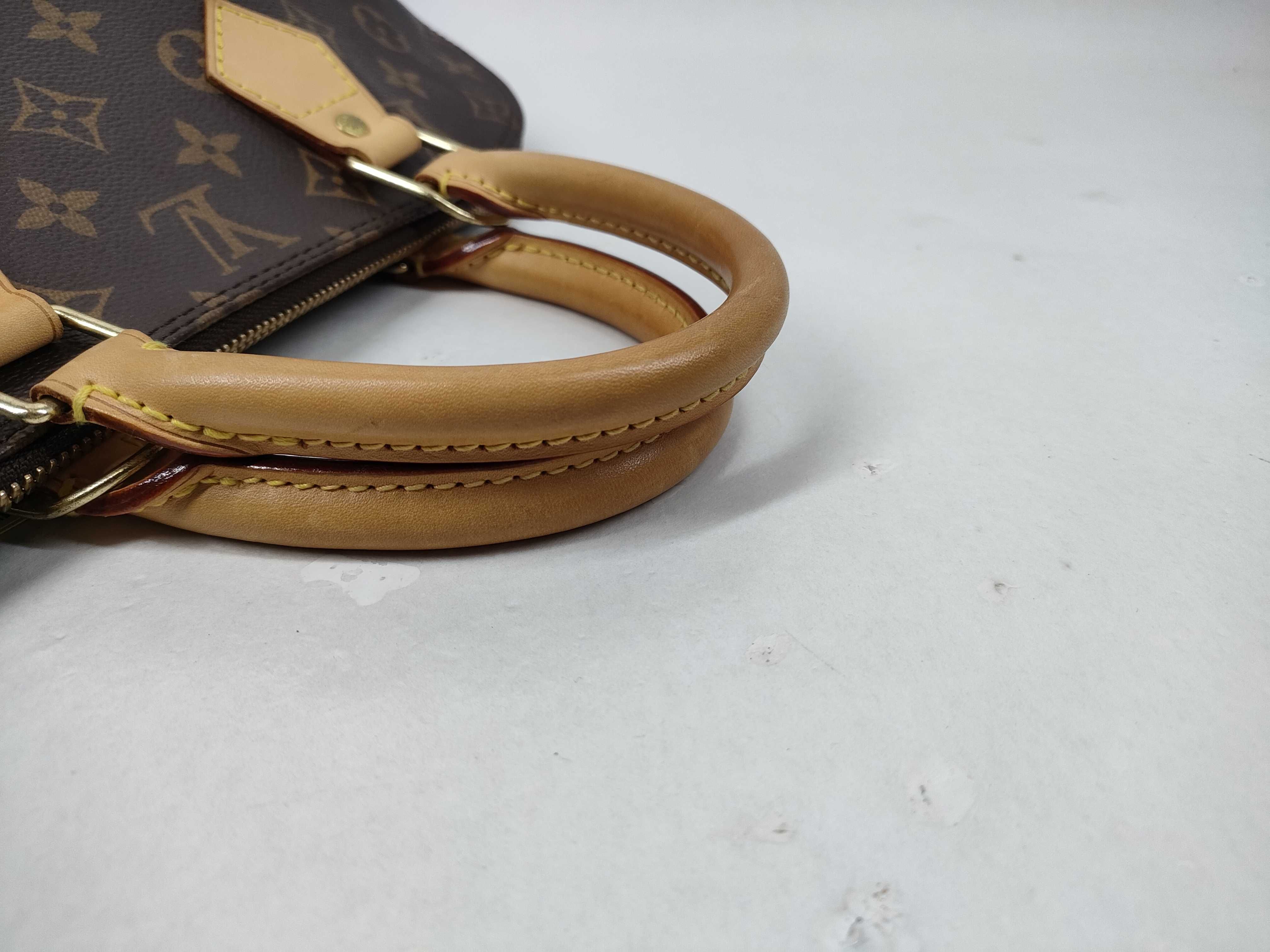 Monogram Alma Handbag (with ST) — view 7