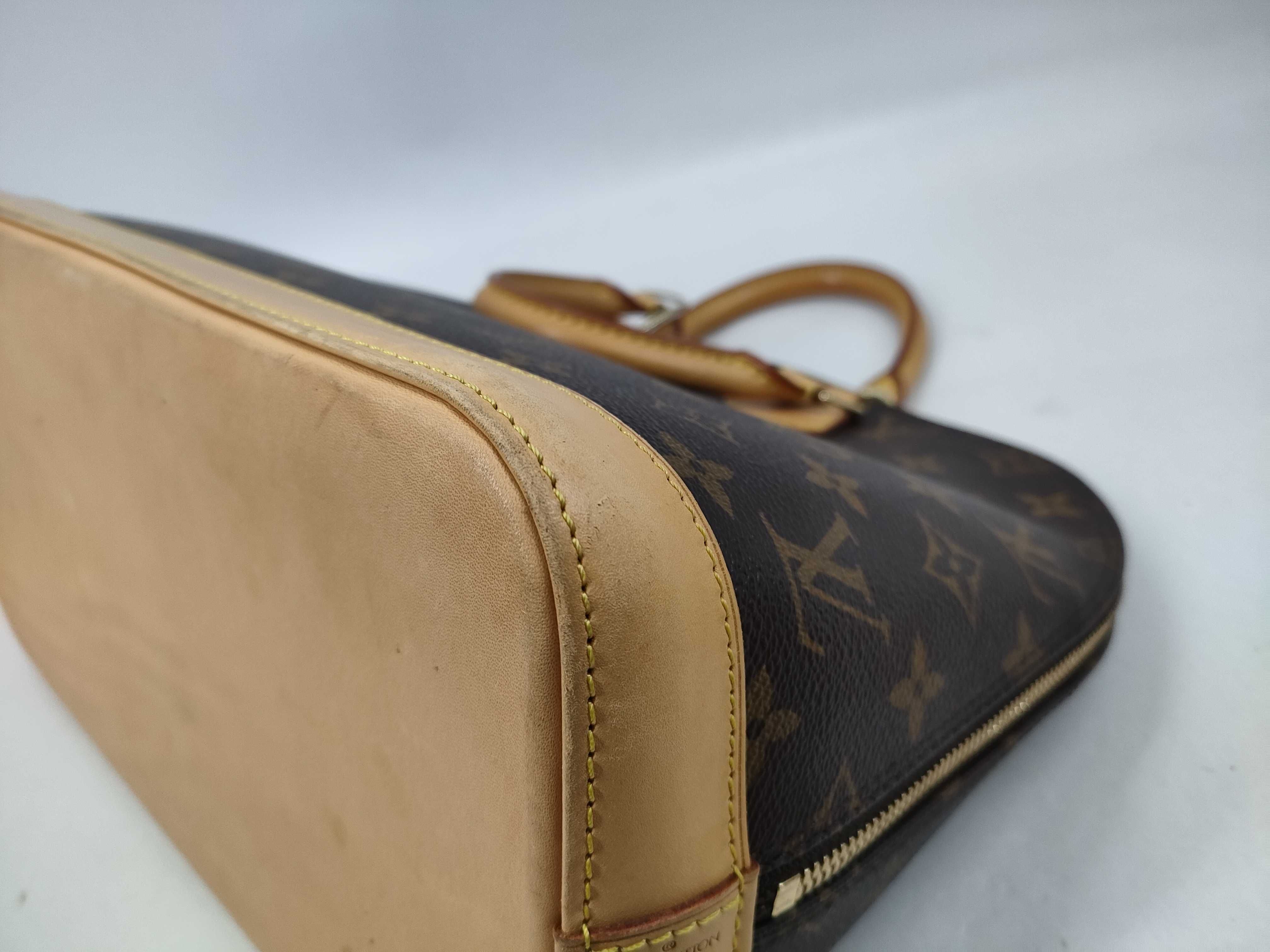 Monogram Alma Handbag (with ST) — view 9