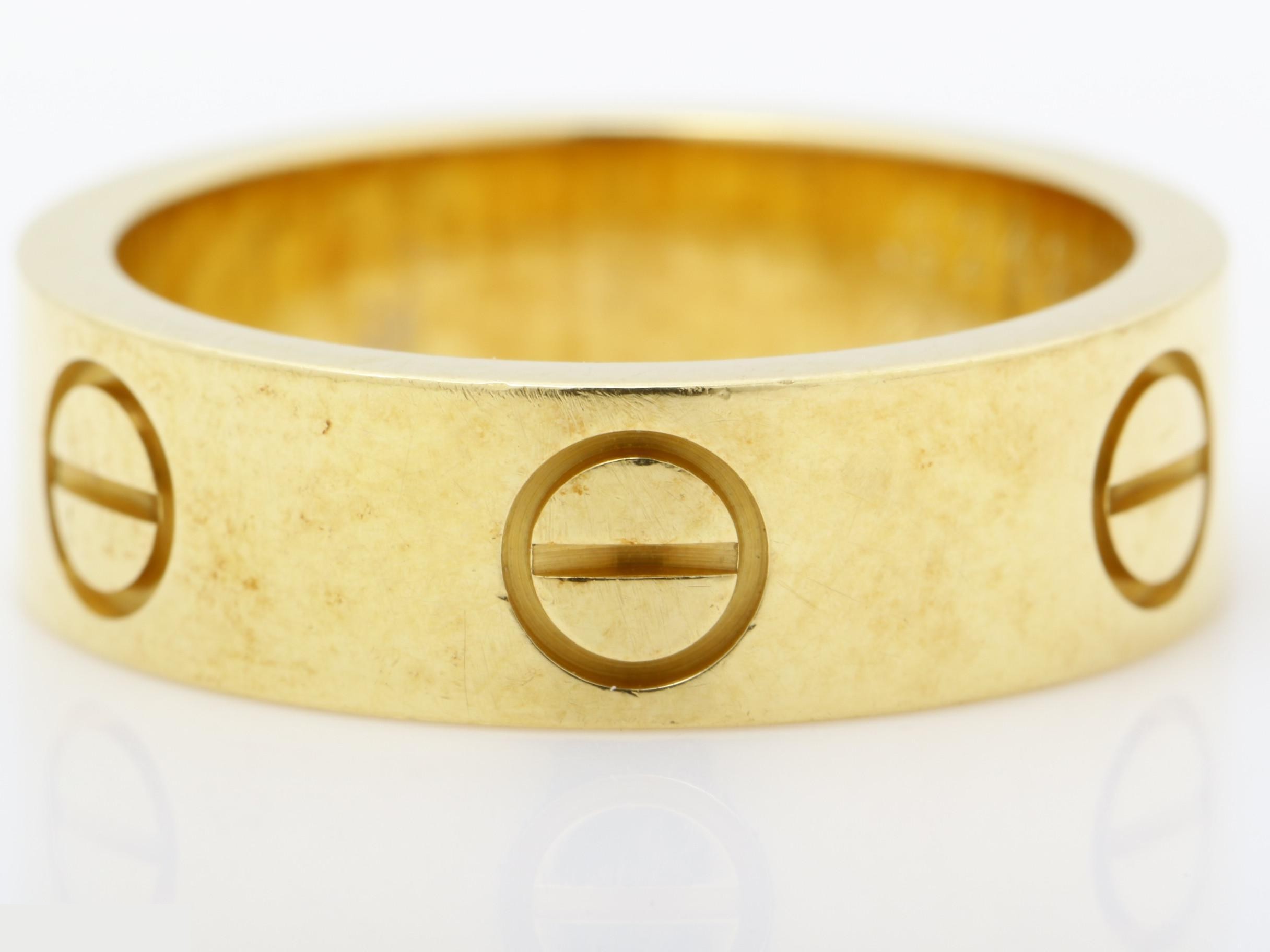Love ring, 750 yellow gold, 7.2g, size #50, width approximately 5.4mm — view 2