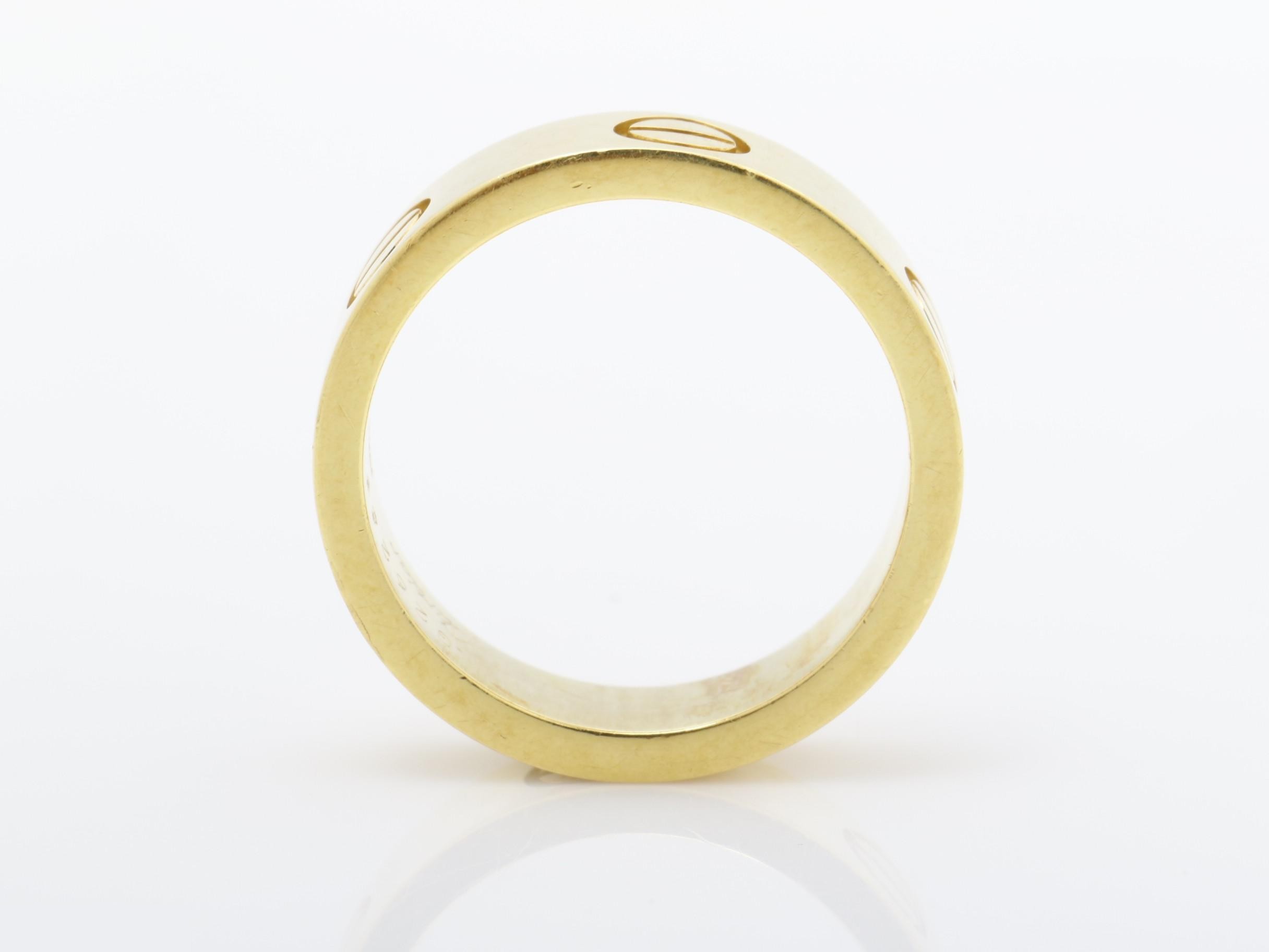 Love ring, 750 yellow gold, 7.2g, size #50, width approximately 5.4mm — view 5