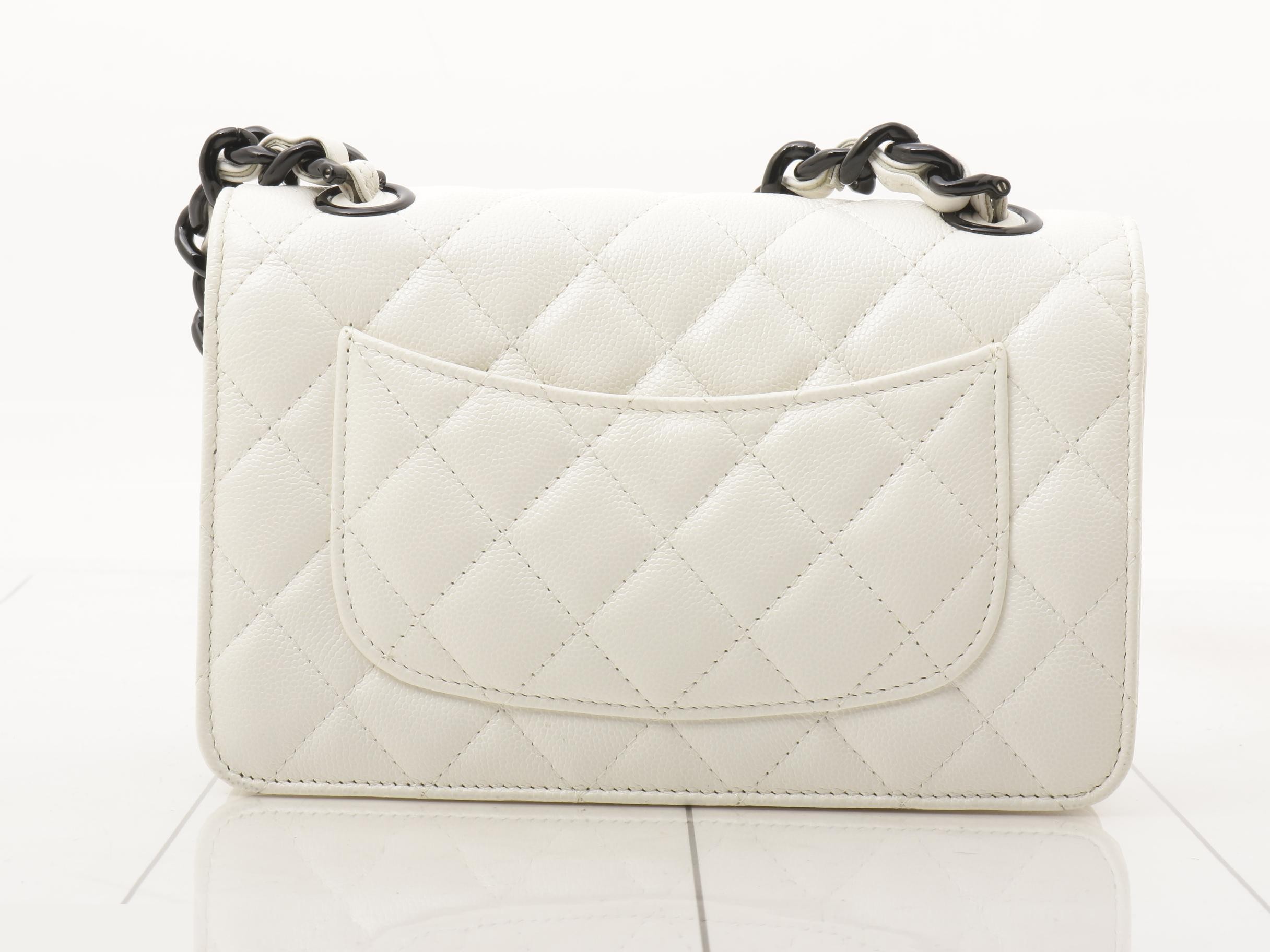 Matelassé caviar leather chain wallet with black hardware, includes card and sticker. — view 2