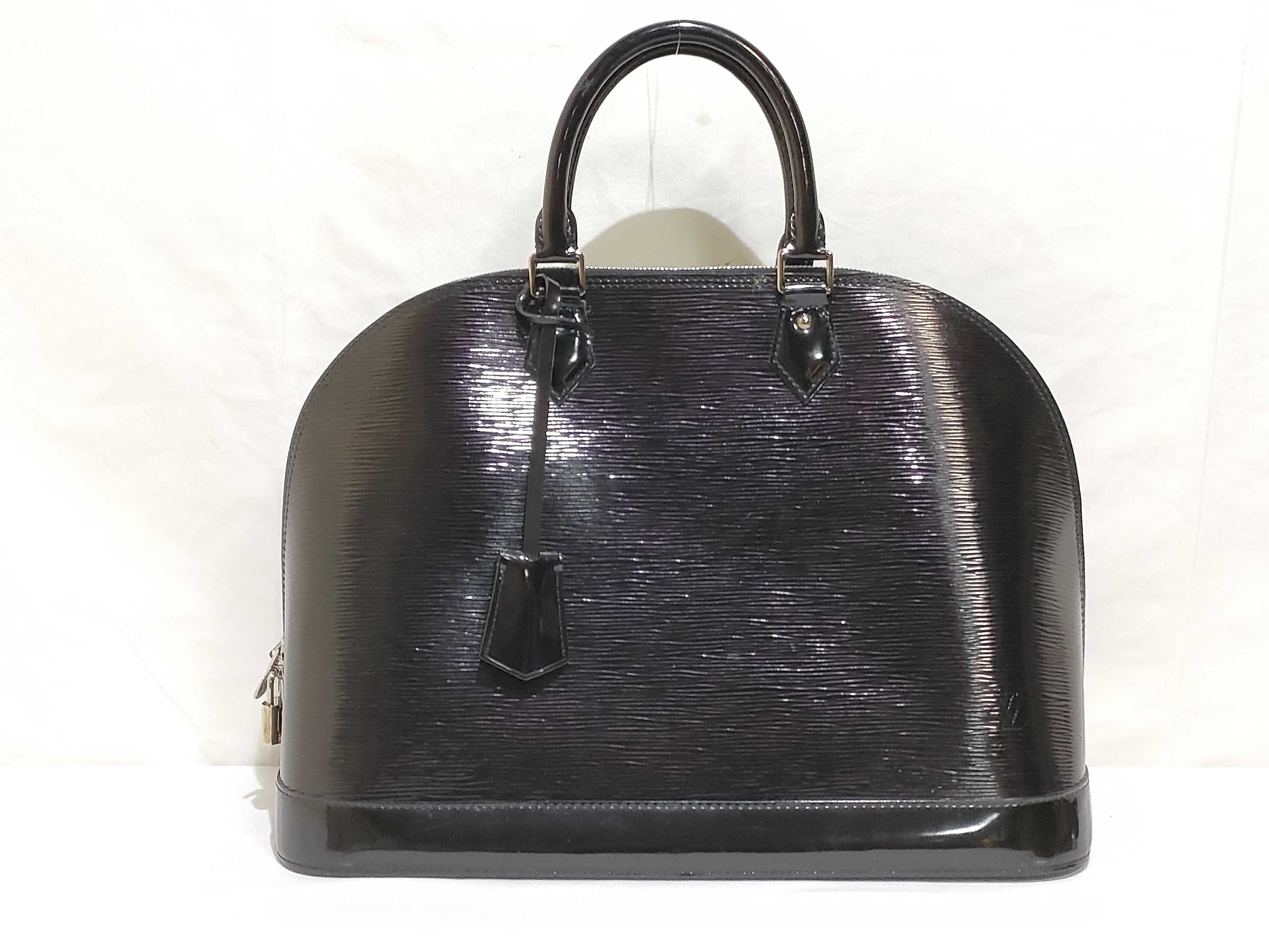 Epi ID- Epi Cowskin Alma GM M40452 Handbag