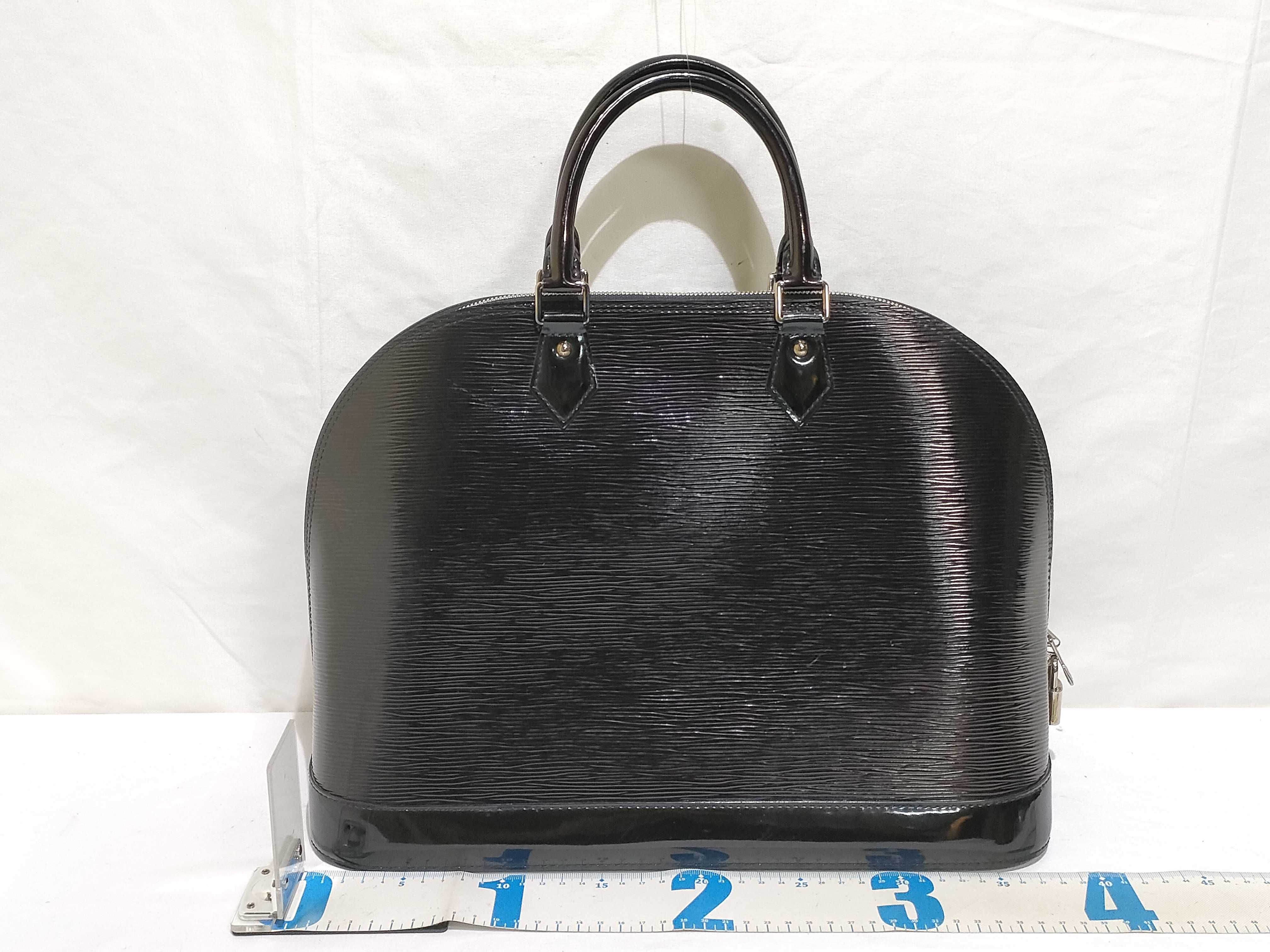 Epi ID- Epi Cowskin Alma GM M40452 Handbag — view 2