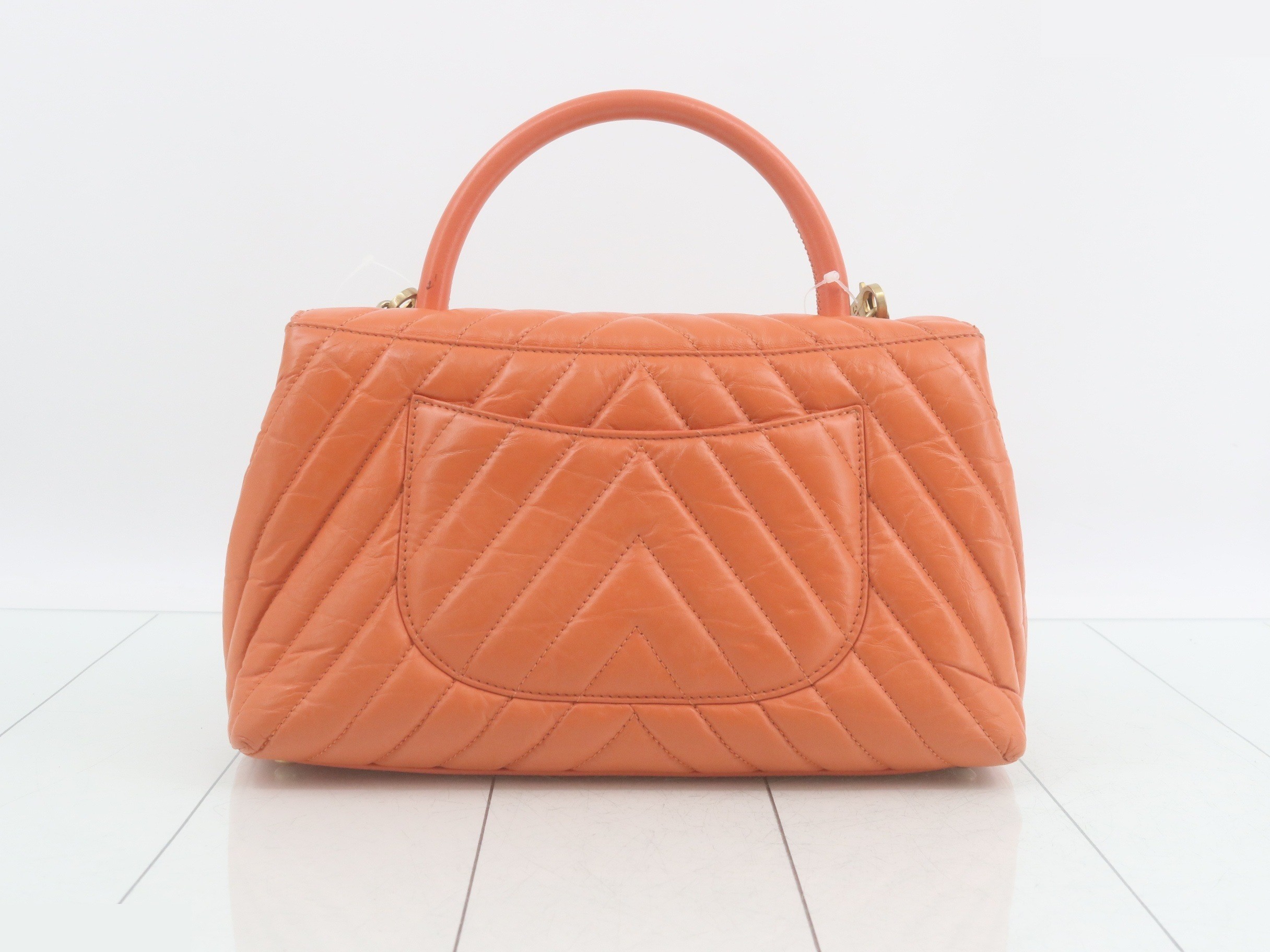V-stitch Coco Handle 29, Orange/G Hardware, Calfskin, Guarantee/Seal/Serial Number 26 — view 2