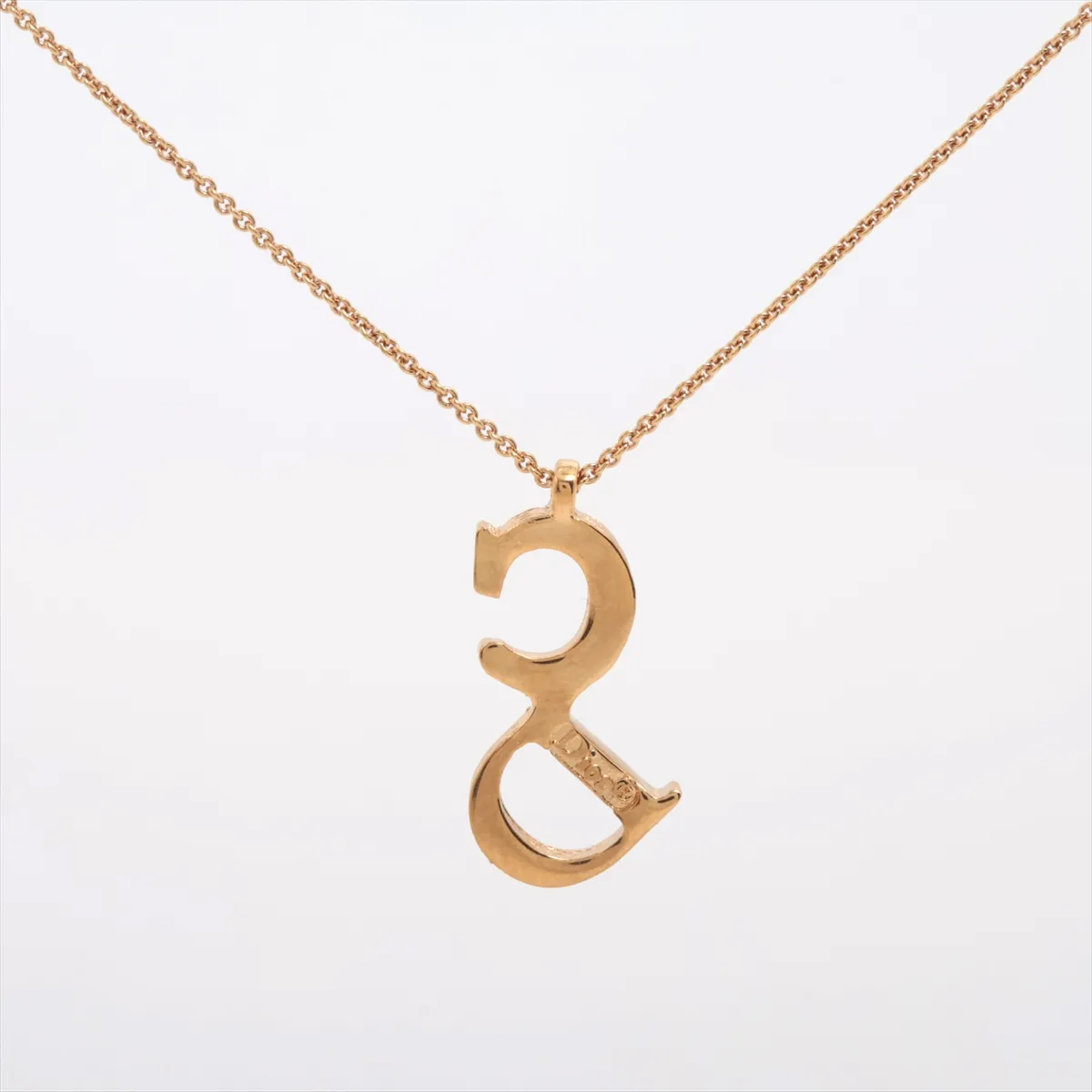 CD logo necklace, GP gold, shows signs of wear, tarnishing, — view 2
