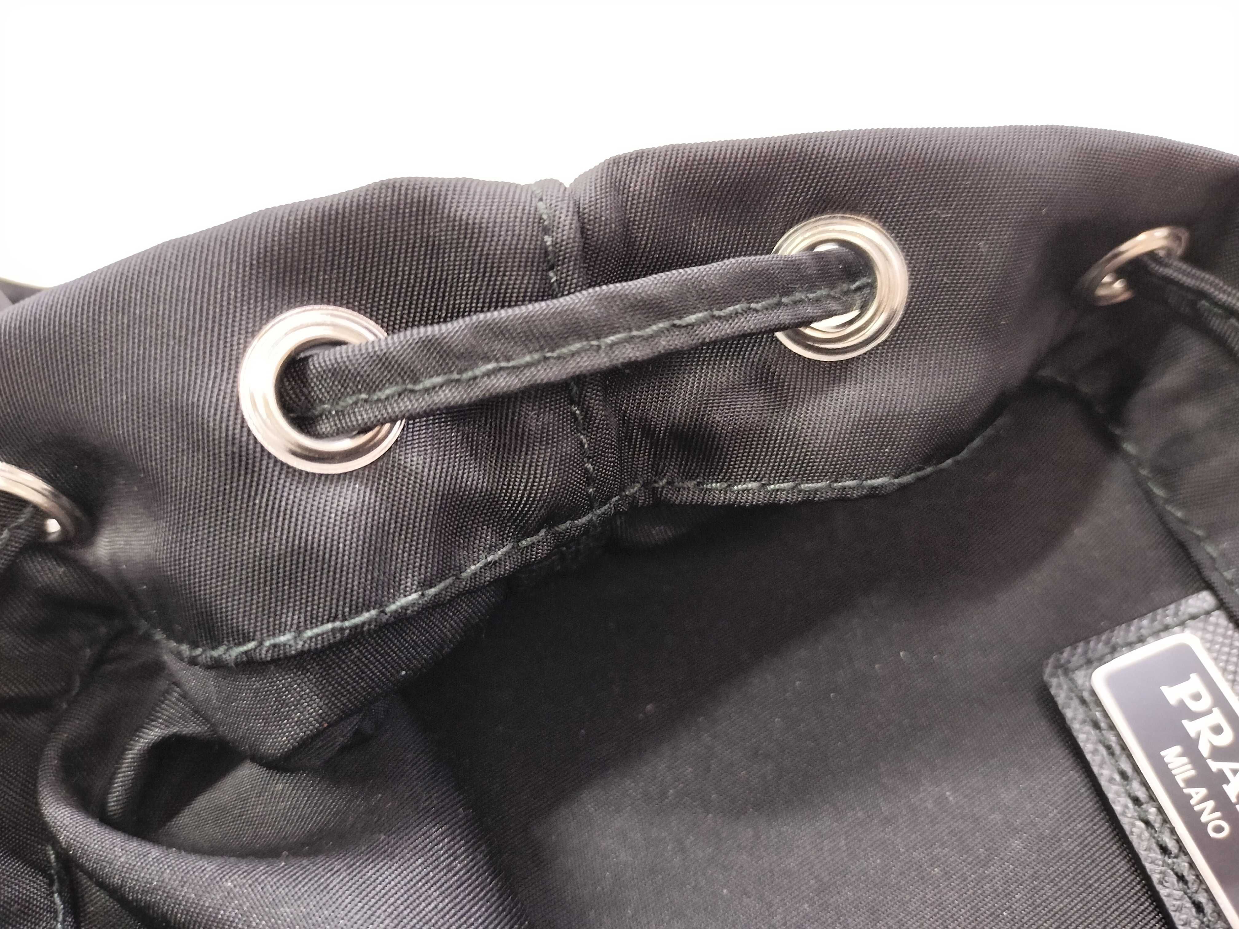 nylon drawstring bag pouch, current model, triangle logo, Tessuto nylon, black pouch. — view 9