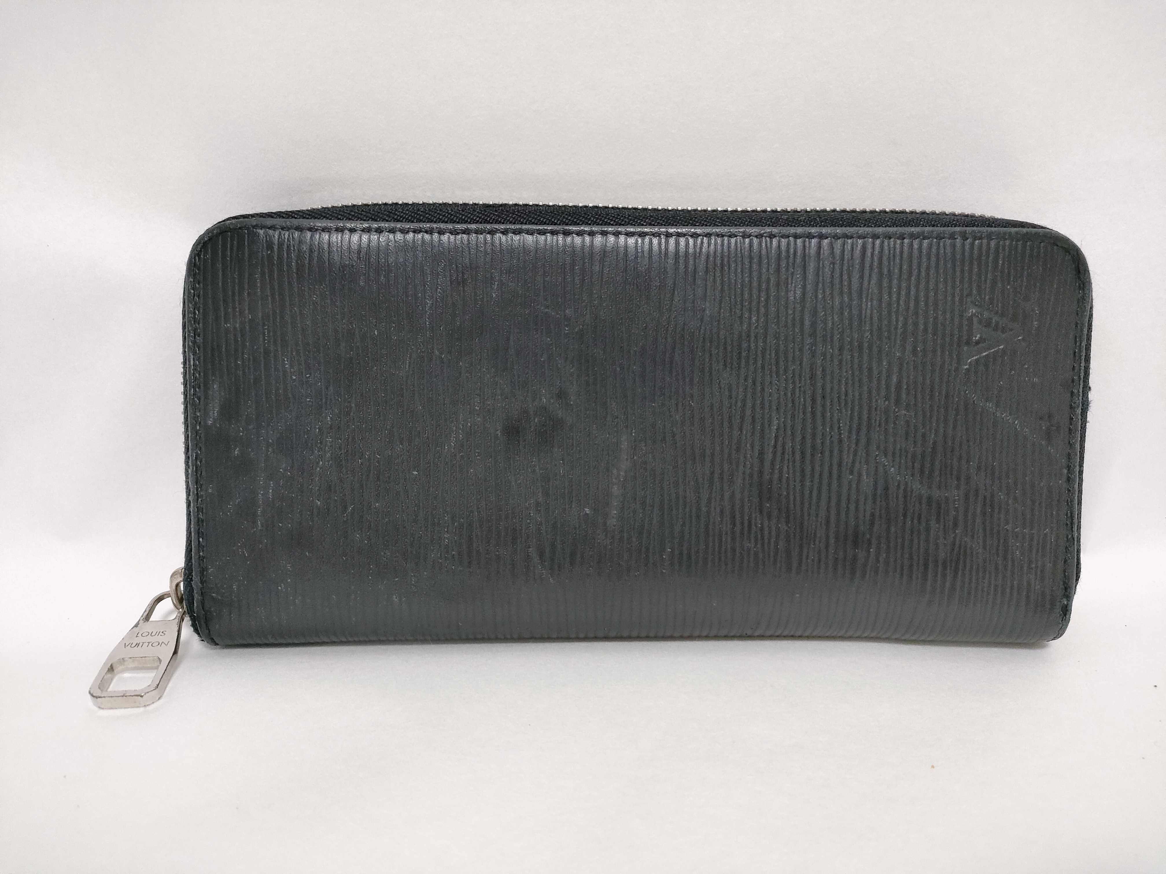 Epi Leather Vertical Wallet M60965