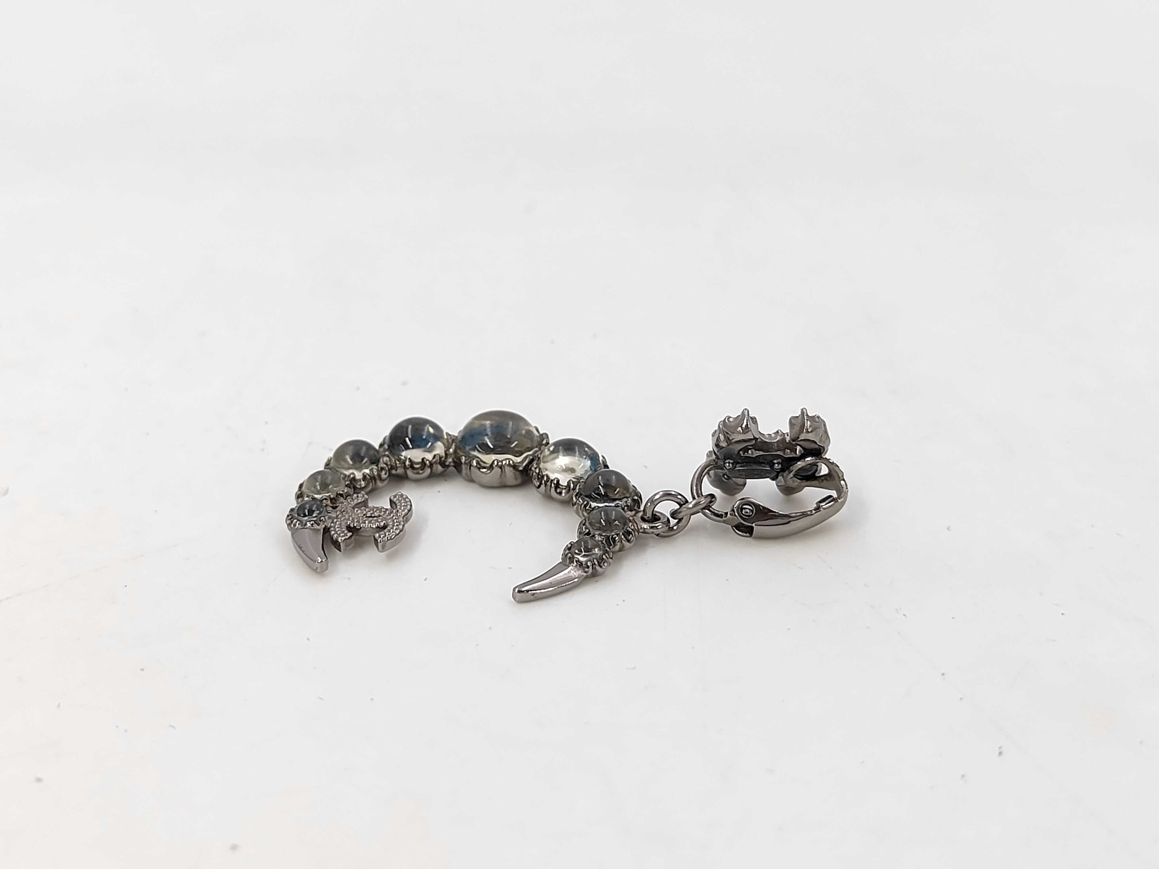Crescent Moon Motif Coco Mark Earrings — view 2