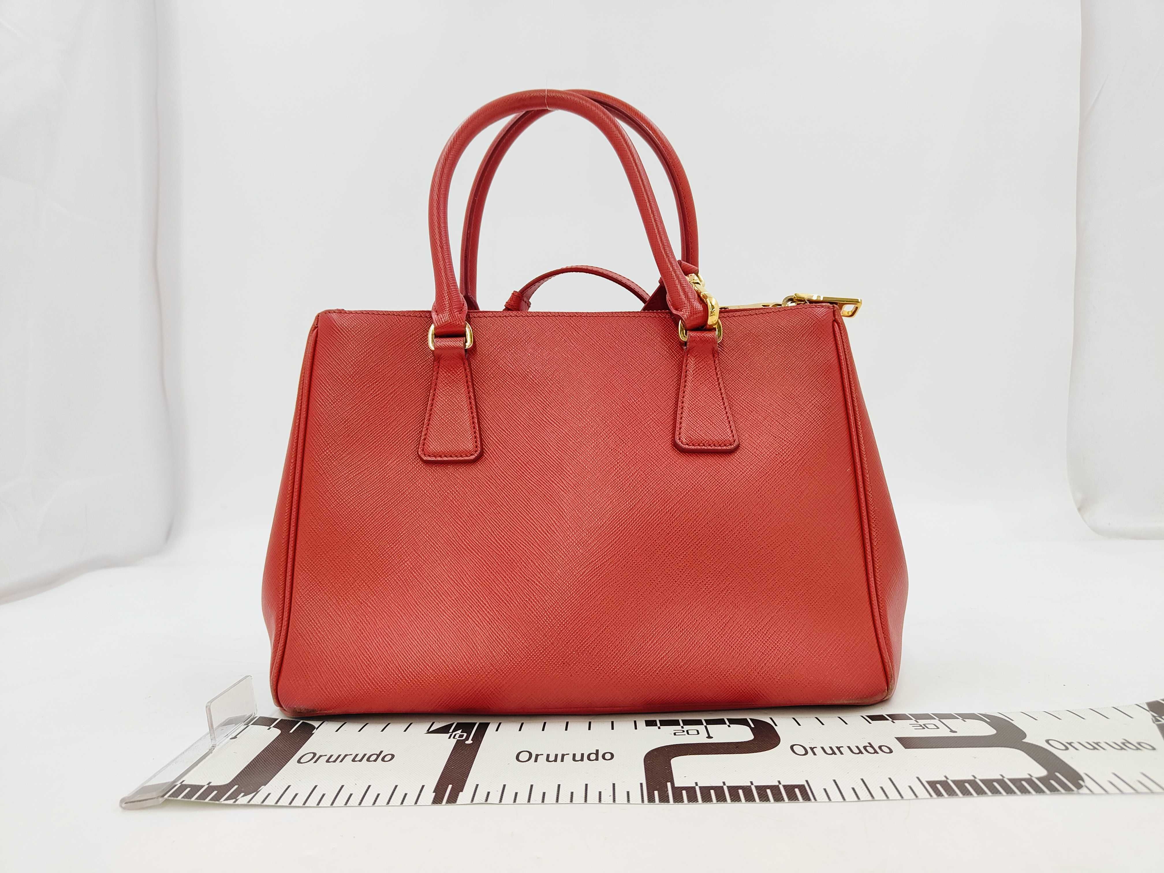 Saffiano Triangle Logo Leather Handbag — view 2