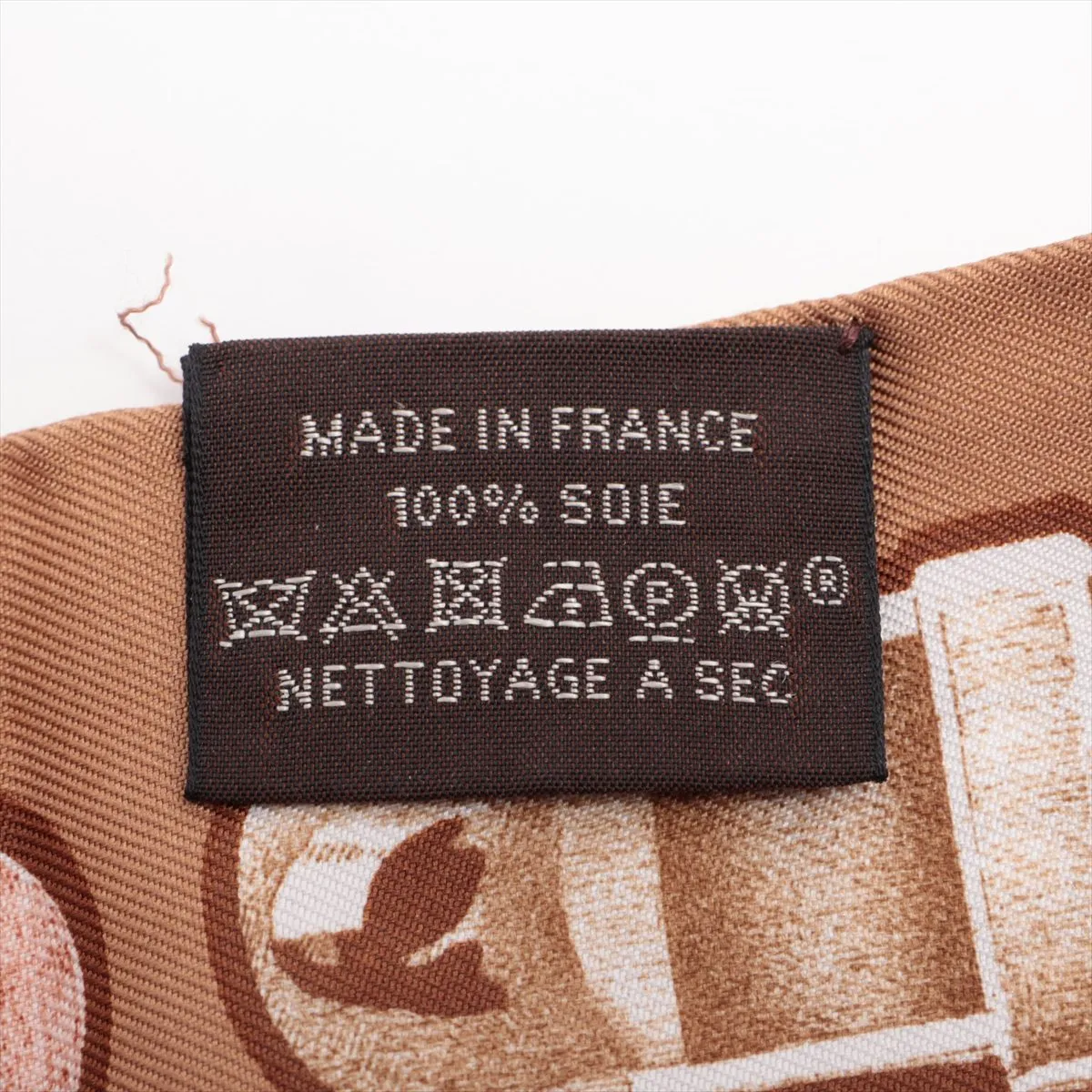 Twilly LE TRESOR DE MEDOR scarf, silk, brown. Shows signs of wear, including snags, loose threads, and a nearly detached tag. — view 4