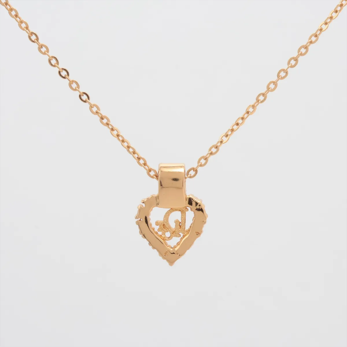 CD Heart Necklace, GP x Rhinestone, Gold. Shows signs of wear including dents, — view 2