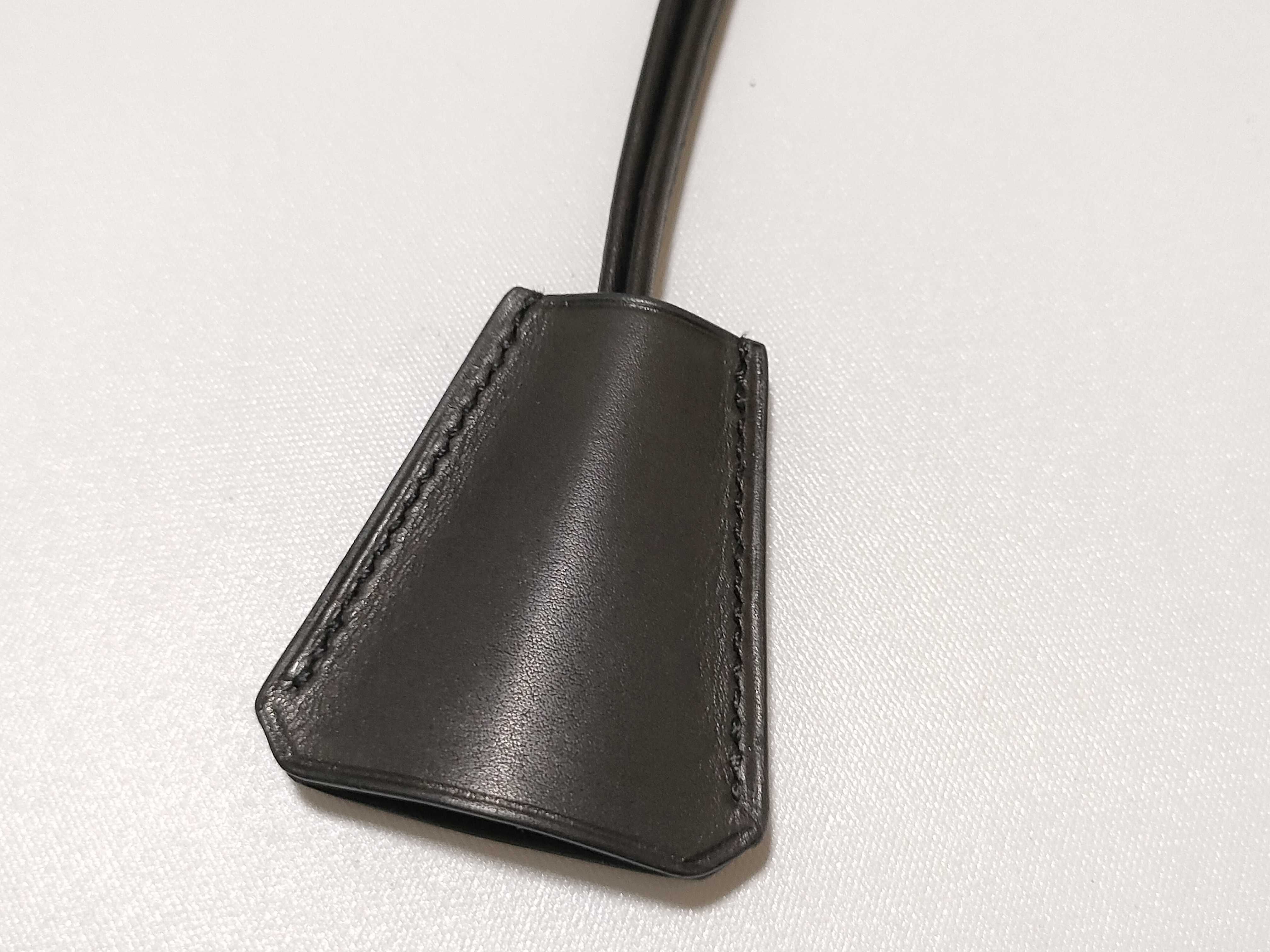 Kelly watch, clochette leather necklace, and other accessories. — view 2