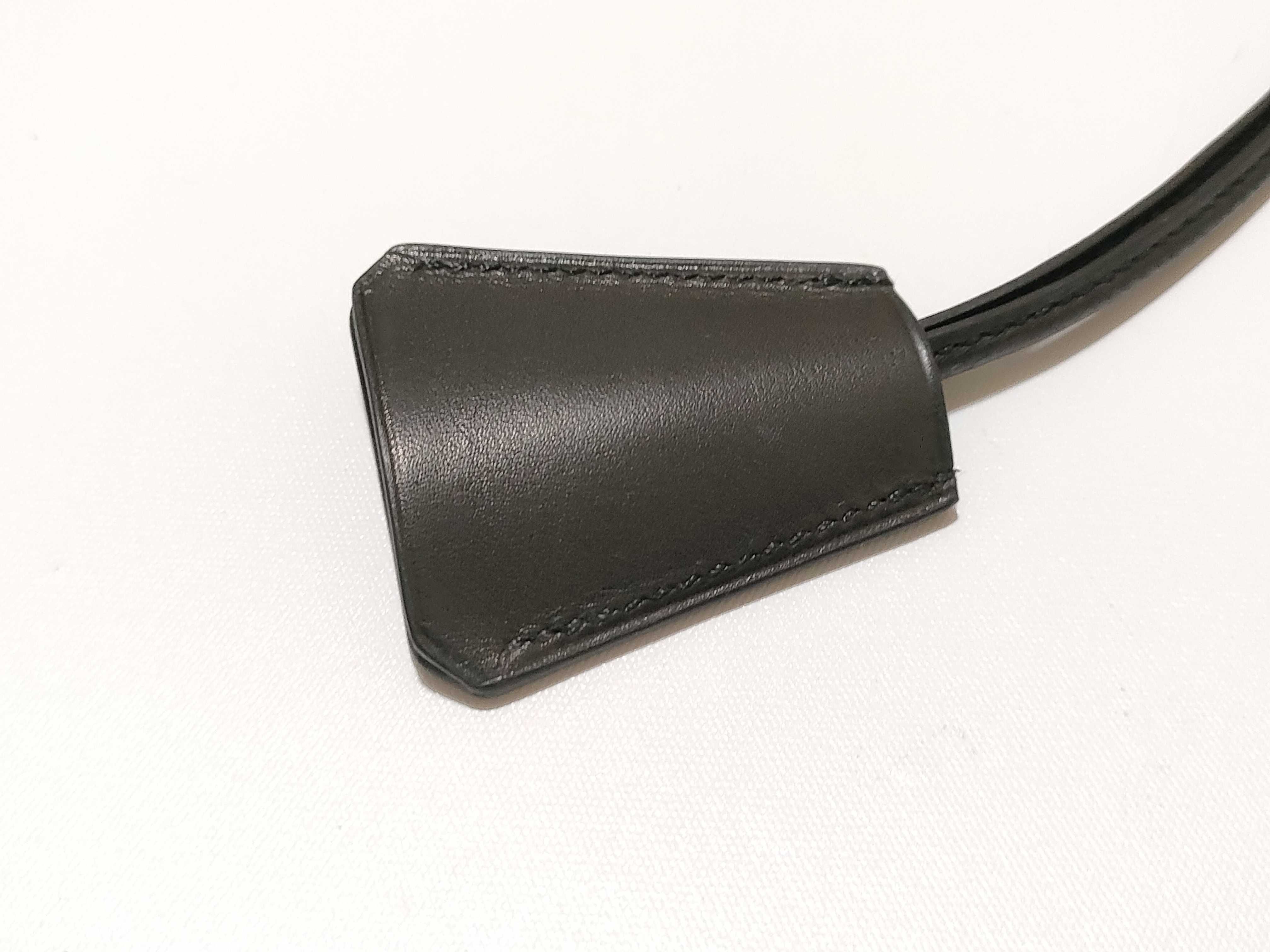 Kelly watch, clochette leather necklace, and other accessories. — view 4