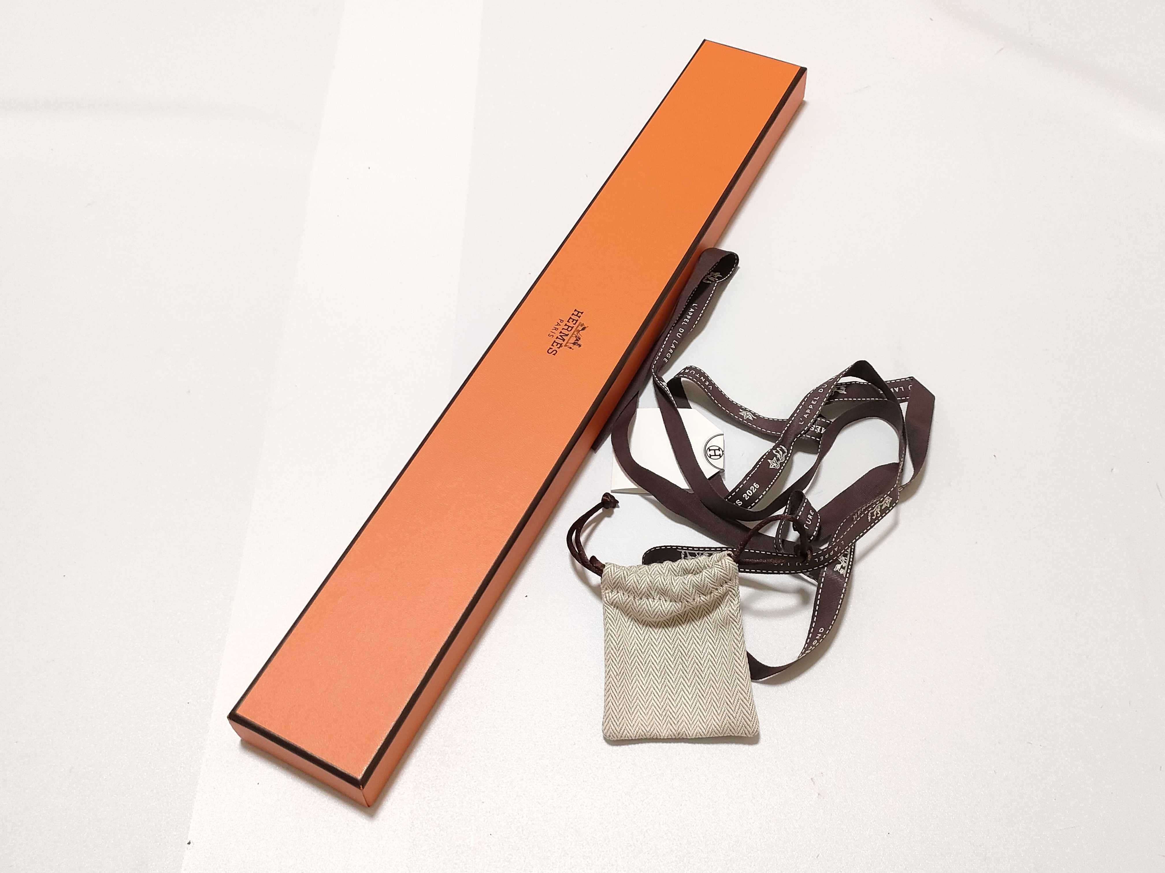 Kelly watch, clochette leather necklace, and other accessories. — view 10