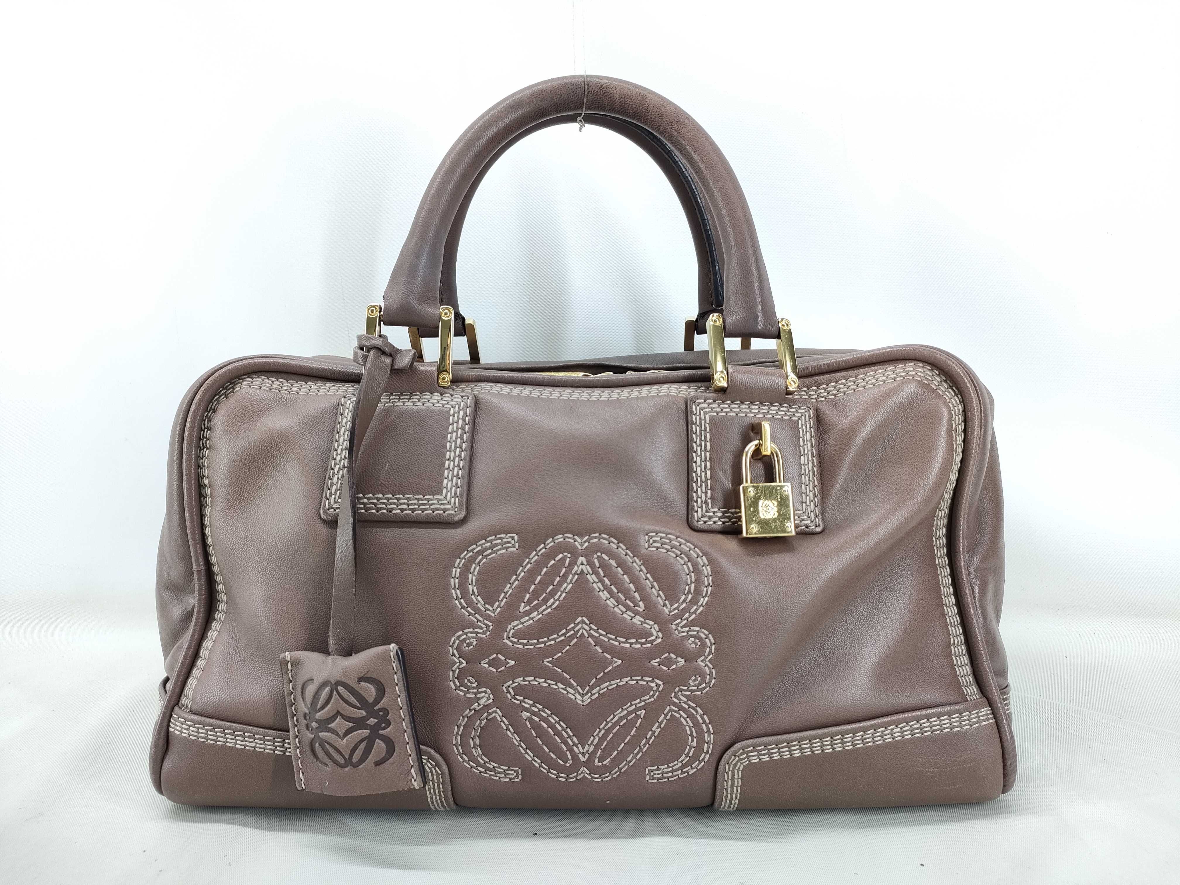Amazona handbag, brown, includes padlock, key, and clochette.