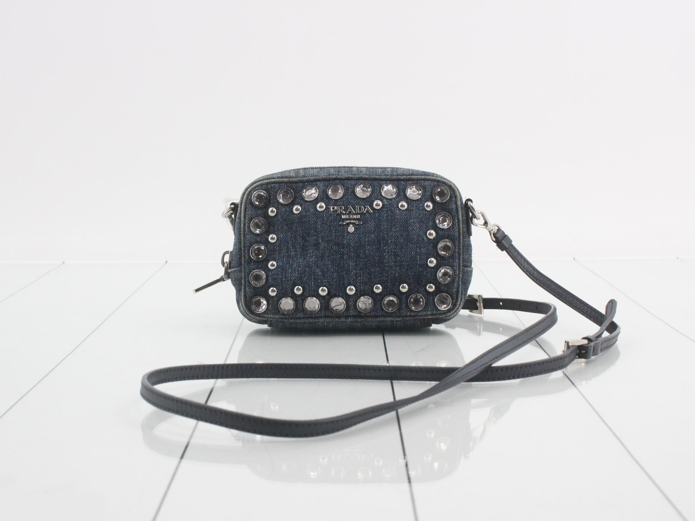 Denim studded shoulder bag