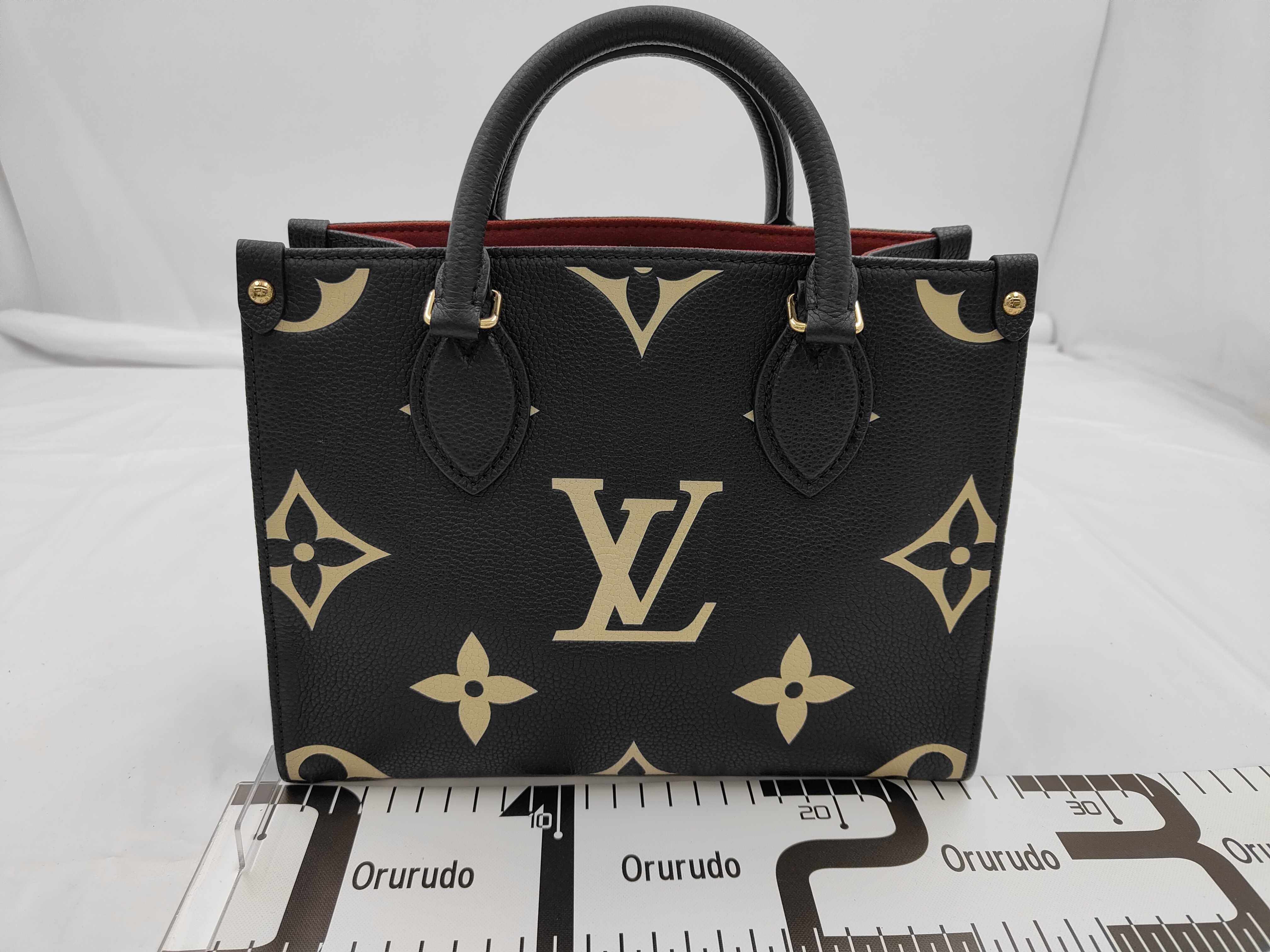 OnTheGo PM Monogram Empreinte Handbag Shoulder Handbag — view 2