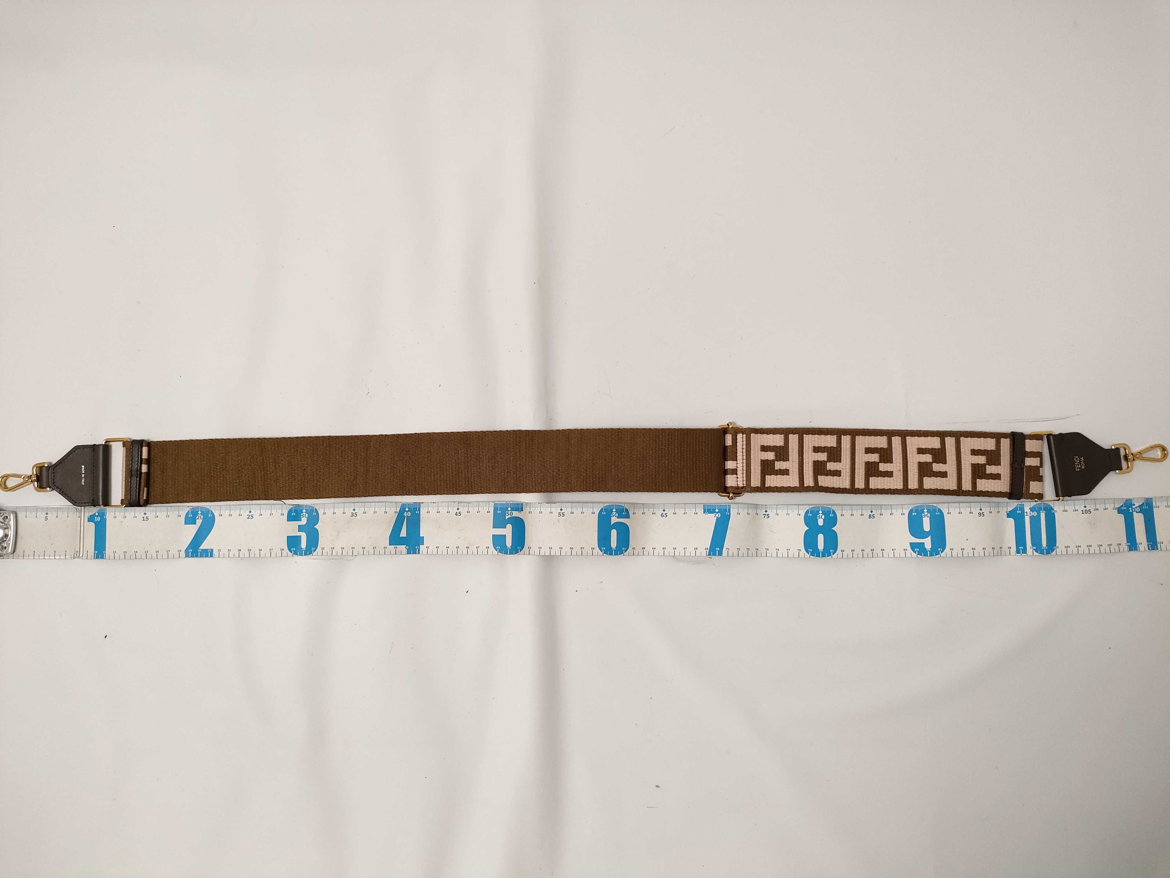 Zucca pattern accessories: Fendi Strap You Zucca pattern pink x brown bag strap, other accessories. — view 9