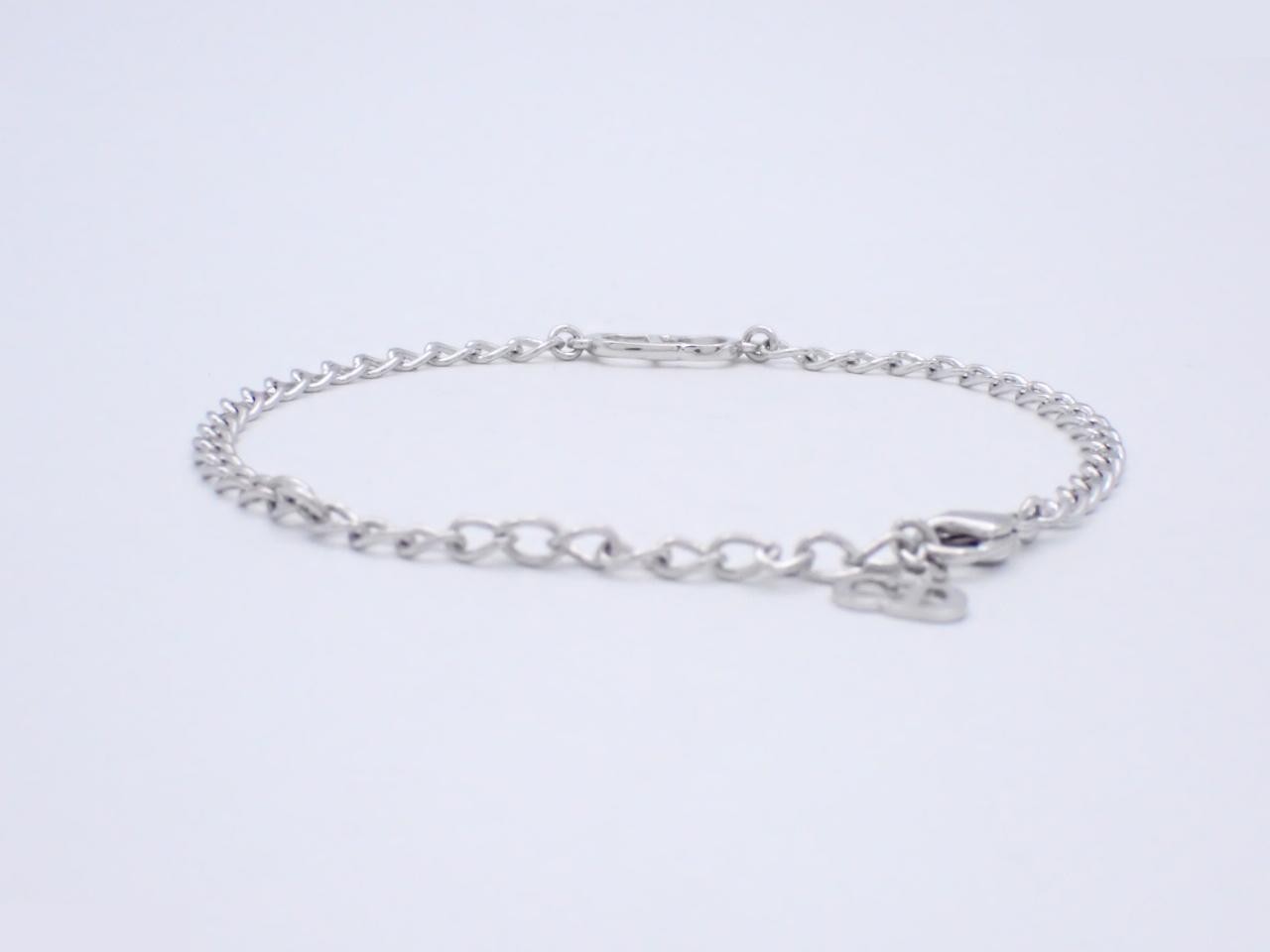 Other items in the line: Precious metal bracelets and bangles (metal), wrist circumference approximately 21.5 cm. — view 2