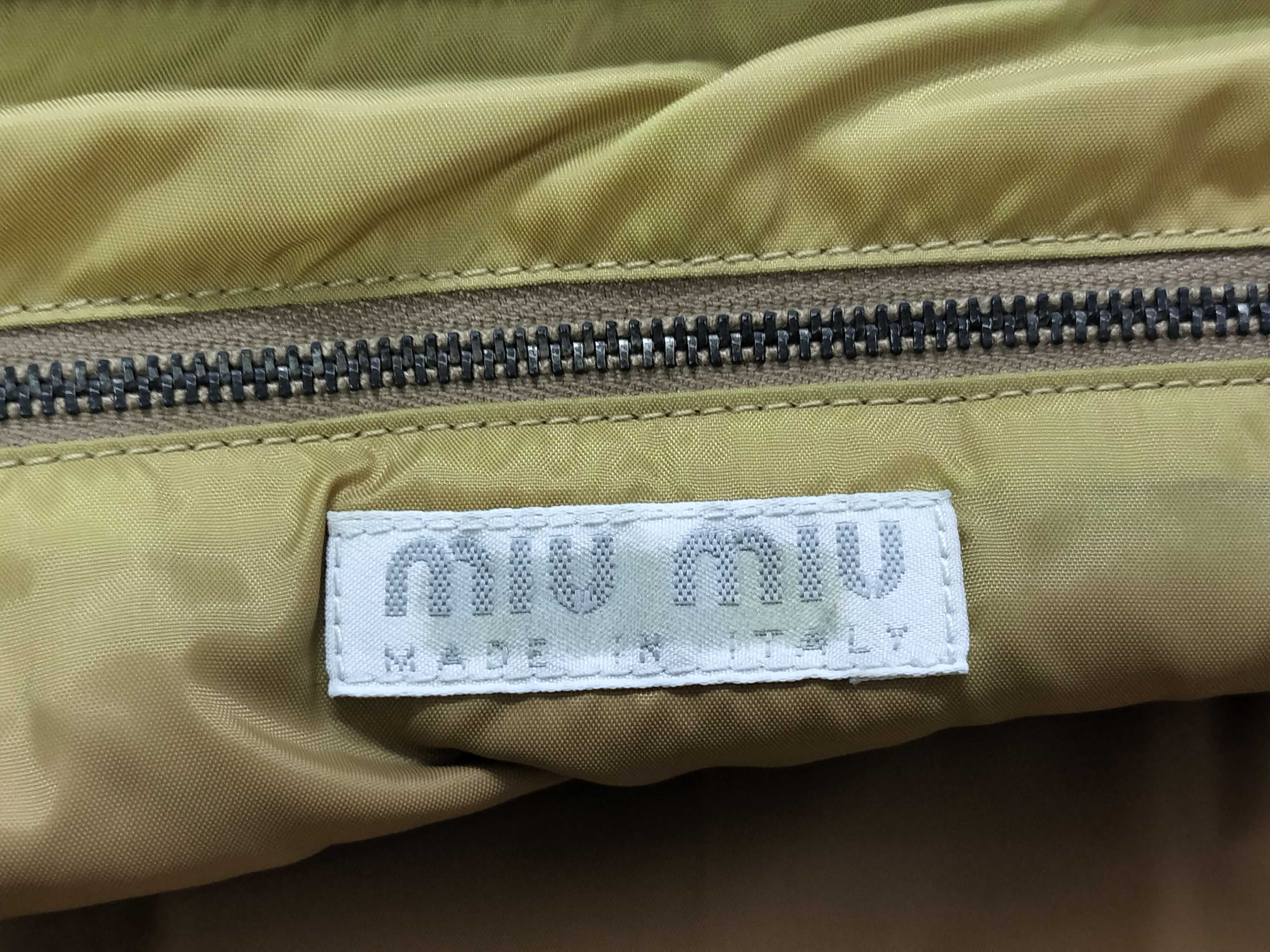 beige handbag — view 9