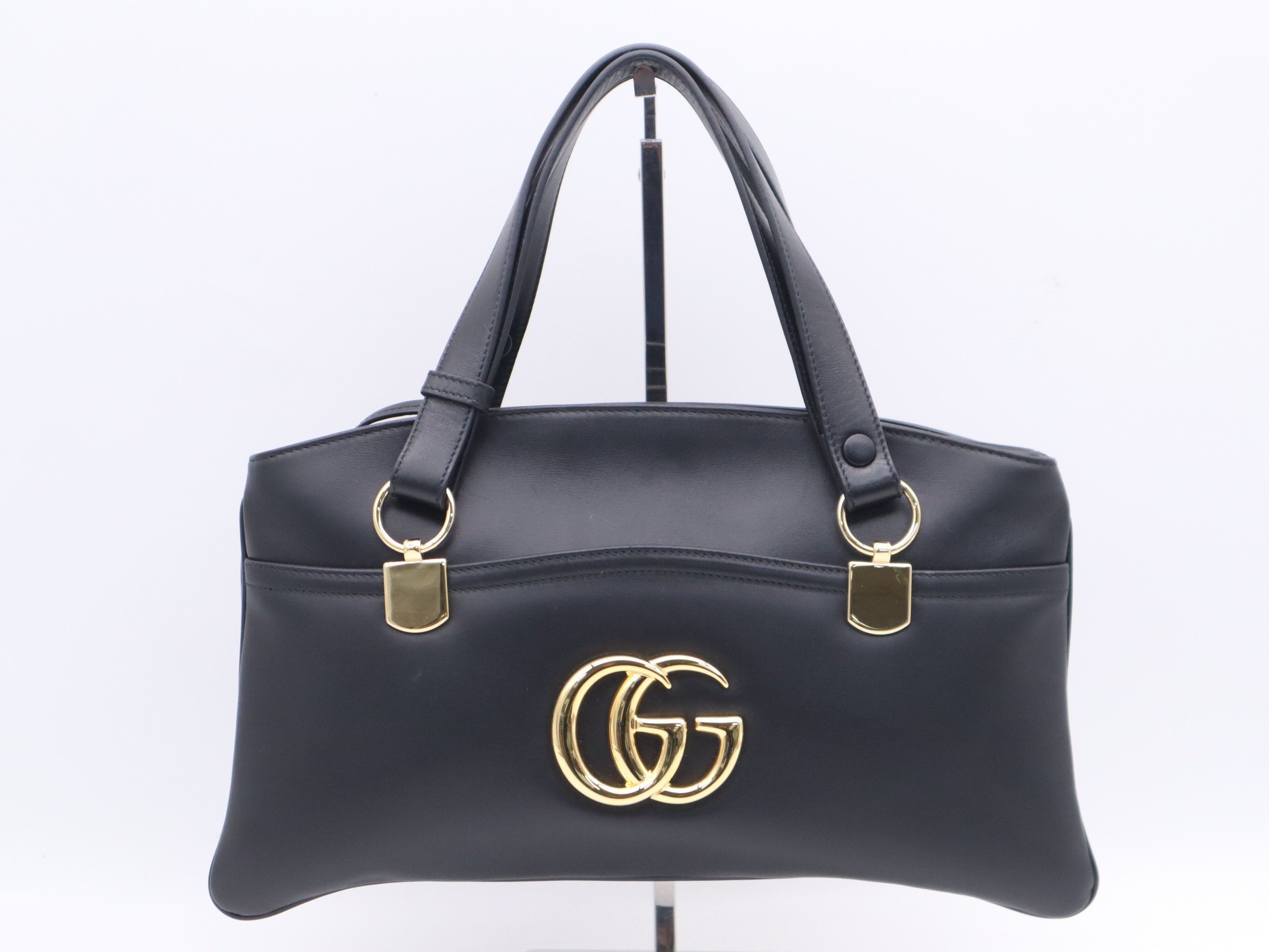 Leather GG Marmont Ally handbag, black, gold hardware.