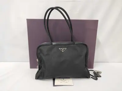 tote bag (with box, padlock, and guarantee)