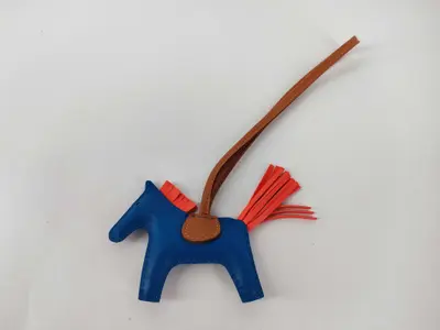 Rodeo Charm PM Blue Zanzibar xR Texas Hermes Y stamp charm