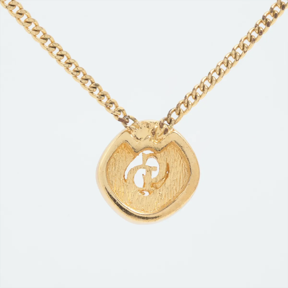 CD logo necklace, gold plated with rhinestones. Shows signs of wear, — view 2