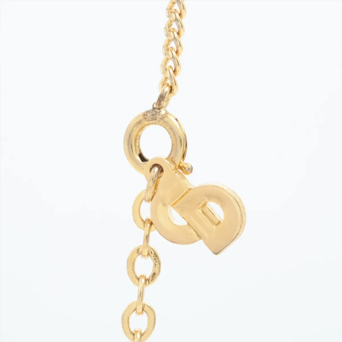 CD logo necklace, gold plated with rhinestones. Shows signs of wear, — view 3