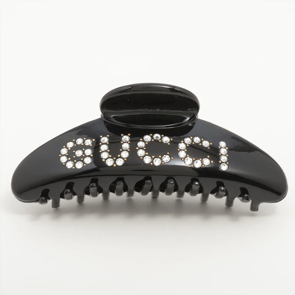 logo hair clip, resin x rhinestones, black. Shows signs of wear, — view 2