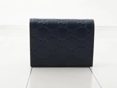 Guccissima bi-fold wallet, unused, blue.