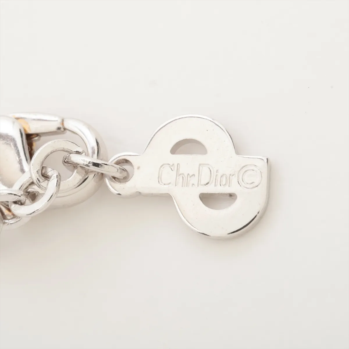 logo necklace, metal and rhinestone, silver. Shows wear, tarnishing, — view 4