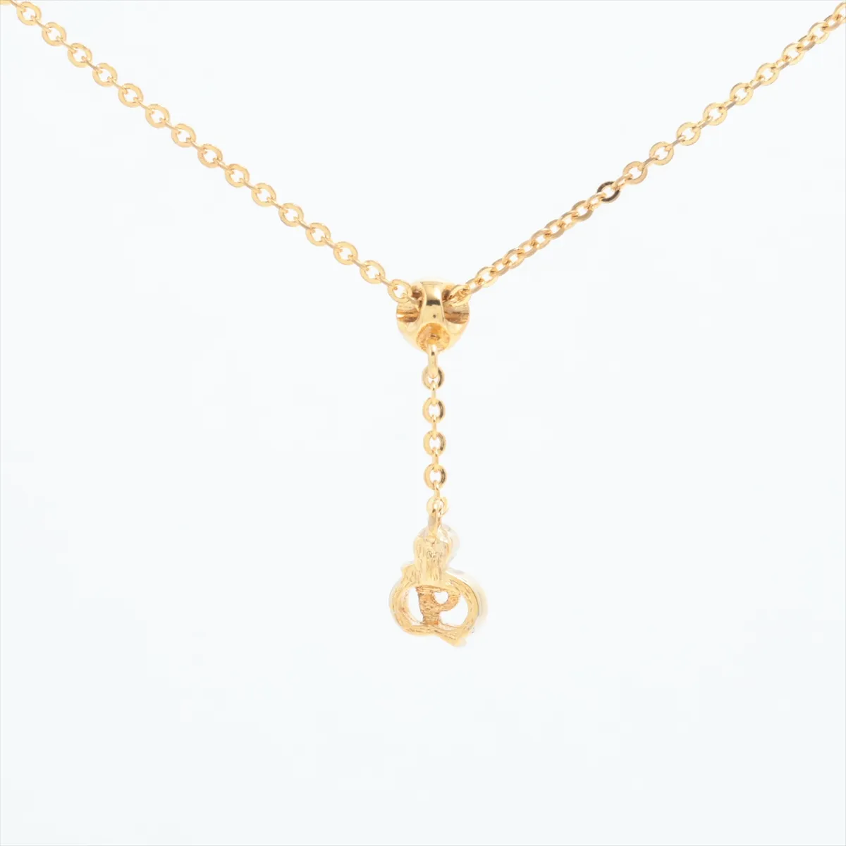 CD logo necklace, gold plated with rhinestones. Shows signs of wear, — view 2