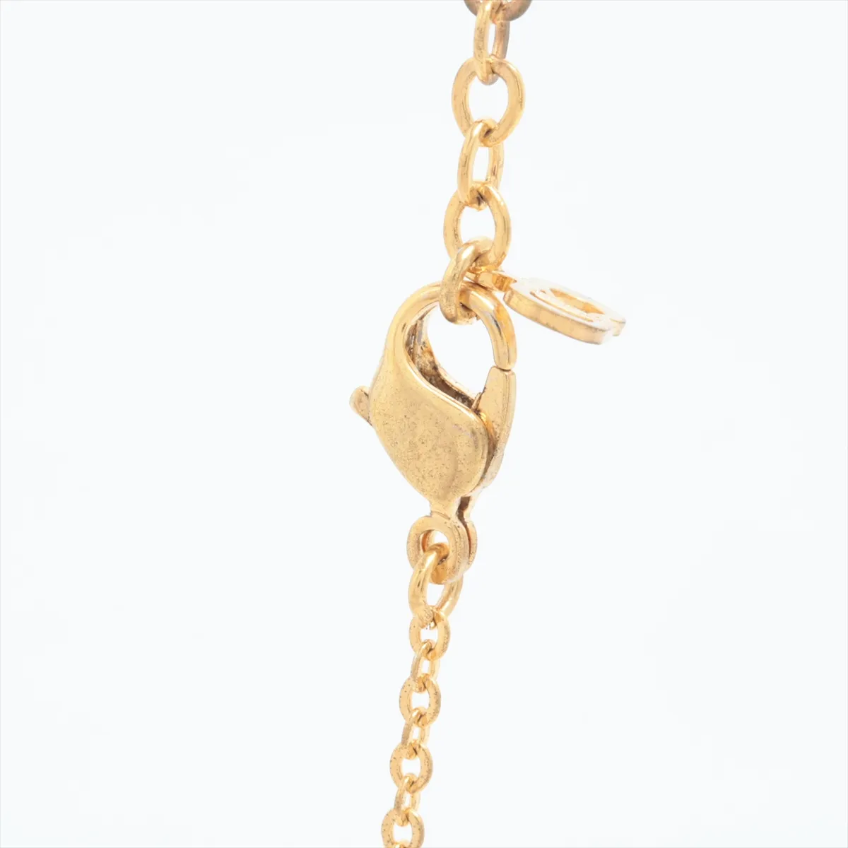 CD logo necklace, gold plated with rhinestones. Shows signs of wear, — view 3