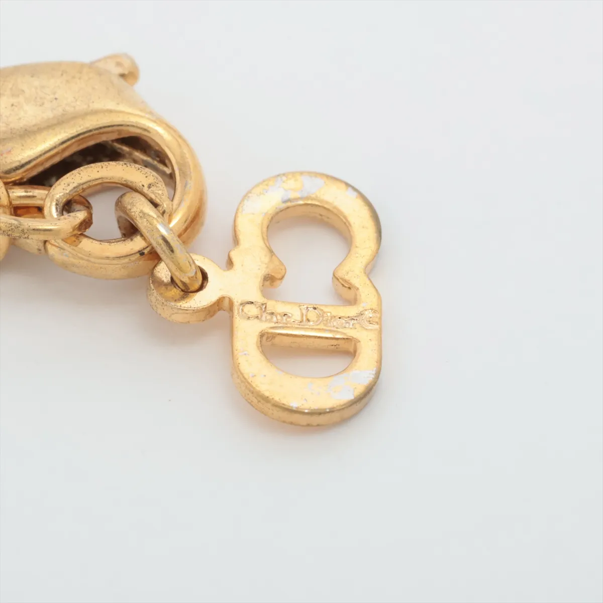 CD logo necklace, gold plated with rhinestones. Shows signs of wear, — view 4